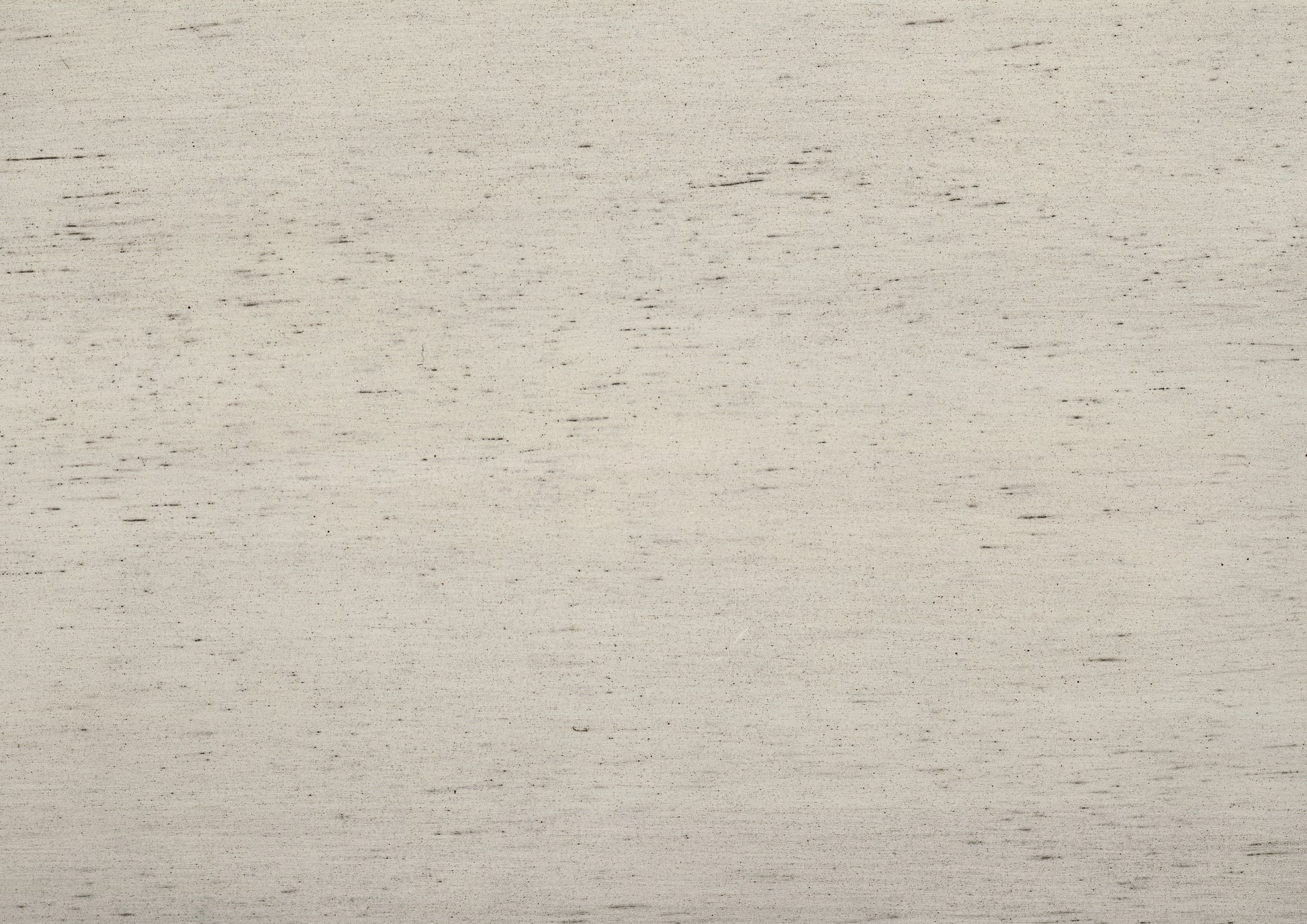 Light gray linen fabric with subtle black speckles ideal for upholstery or home decor