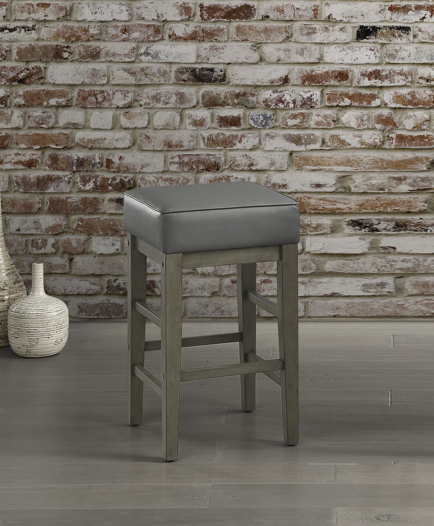 Gray faux leather square seat bar stool with distressed wood legs