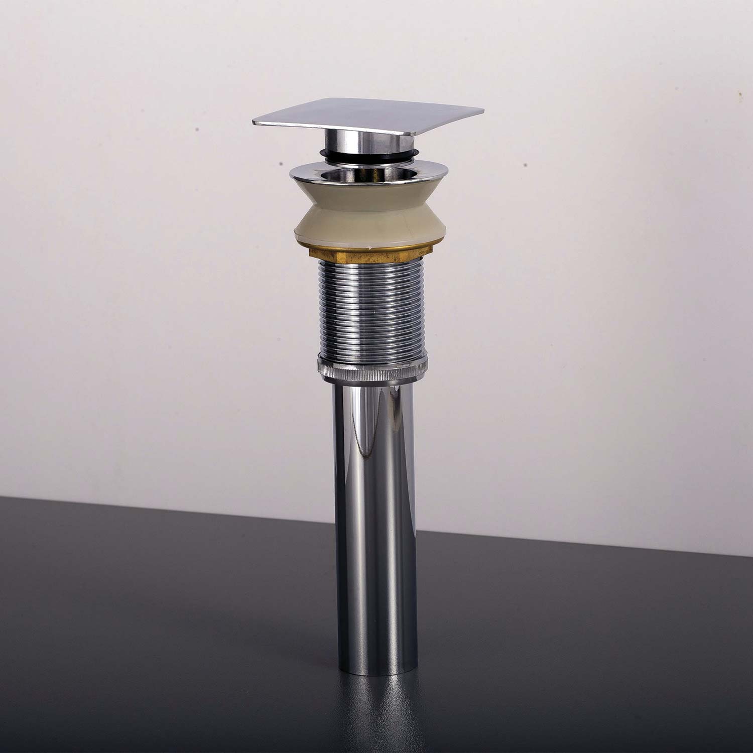 Polished chrome square popup drain assembly for bathroom sinks with rubber seal