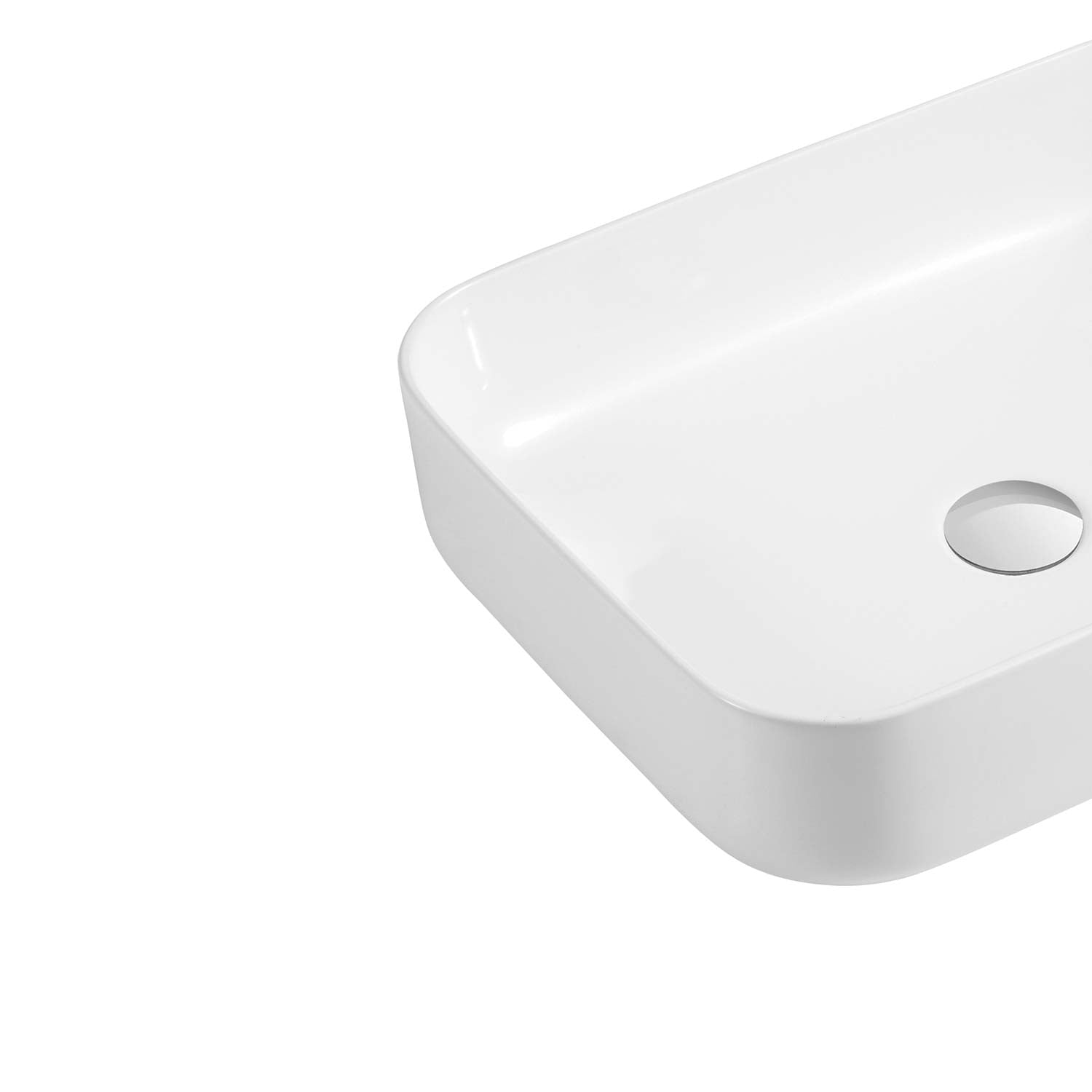 White ceramic vessel sink with rounded edges and drain hole