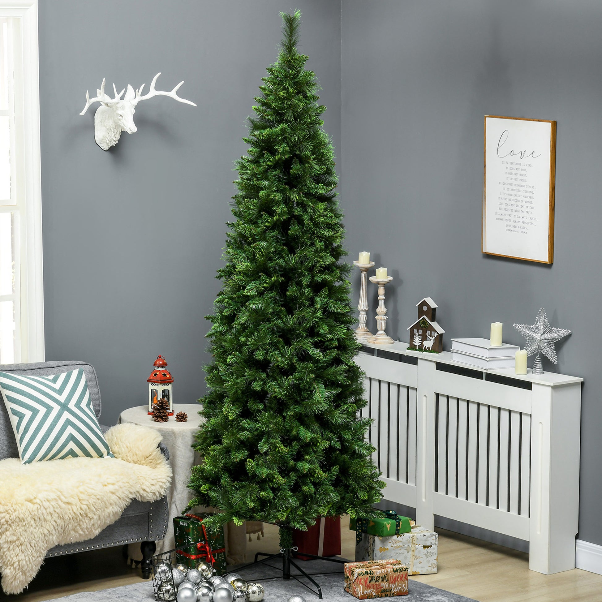 Tall artificial Christmas tree with realistic green branches perfect for holiday decorating