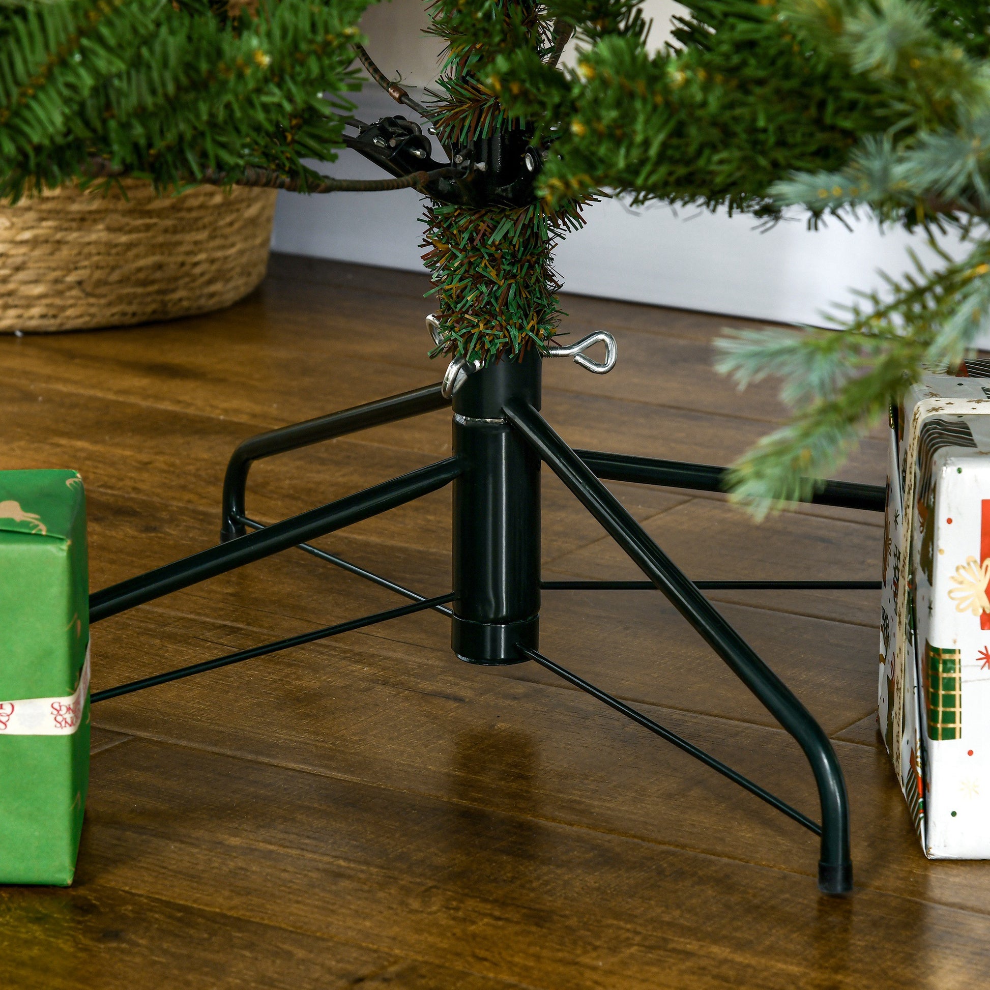 Durable metal Christmas tree stand with sturdy legs and adjustable screw for stability