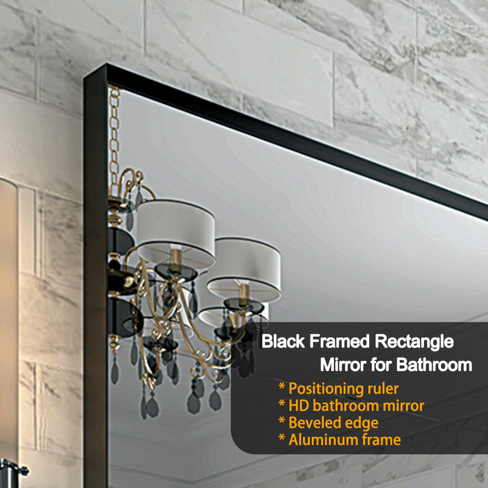 Rectangle bathroom mirror with sleek black aluminum frame reflecting a chandelier