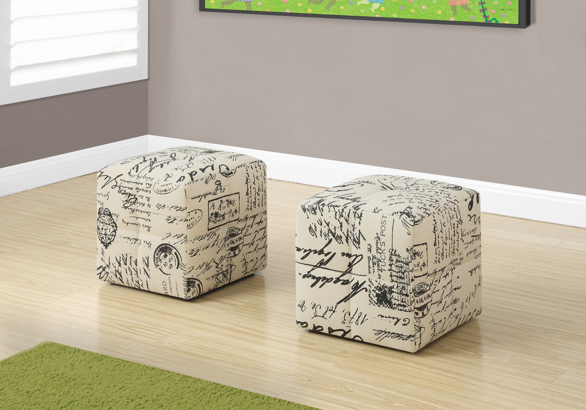 Cream fabric ottoman with vintage script print offers stylish seating or footrest