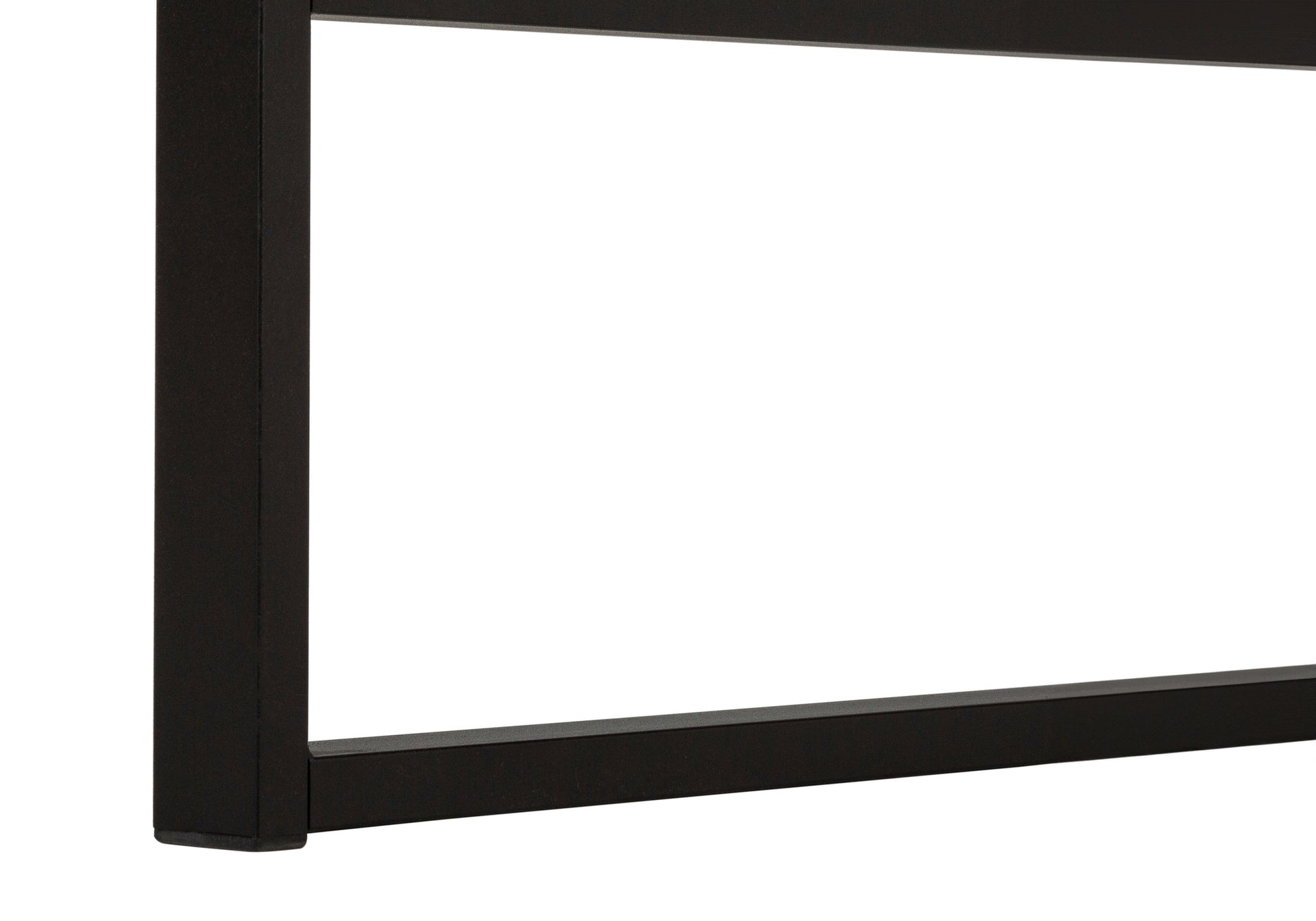 Closeup of matte black metal table legs with clean geometric lines