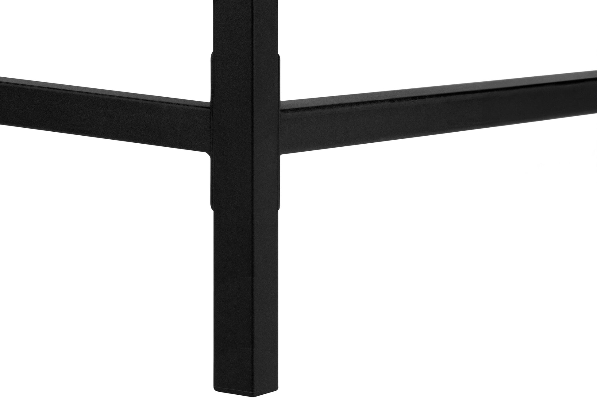 Closeup of matte black metal legs for a modern side table