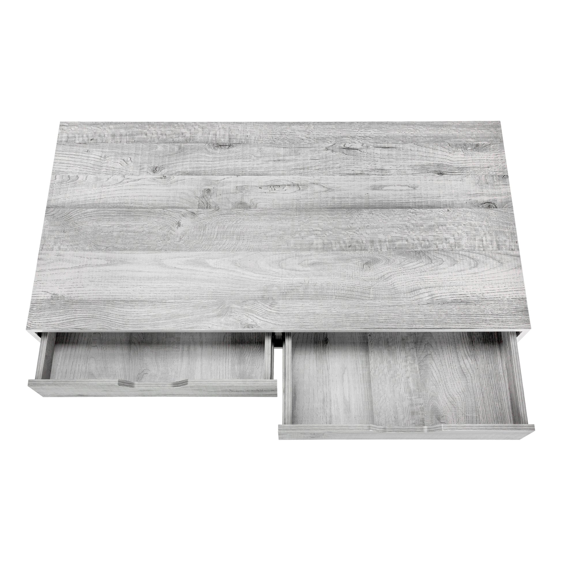 Light gray wood grain desk with two open drawers showing interior wood texture