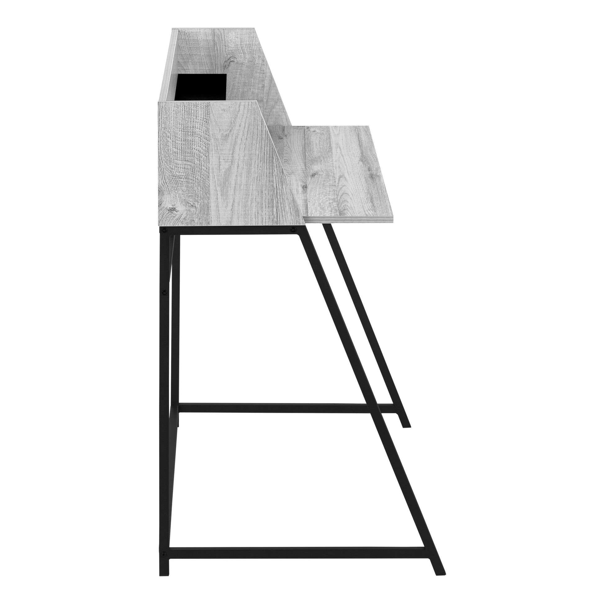 Modern grey wash wood desk with black metal legs and a sloped top shelf