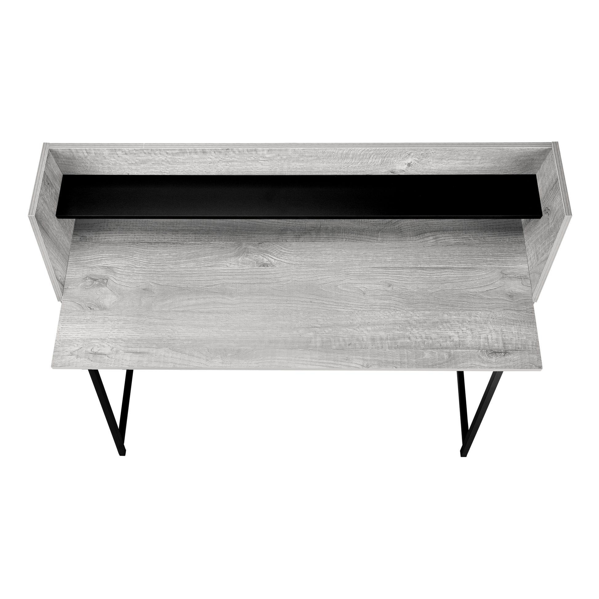 Modern grey wood floating desk with black metal legs and a sleek black shelf