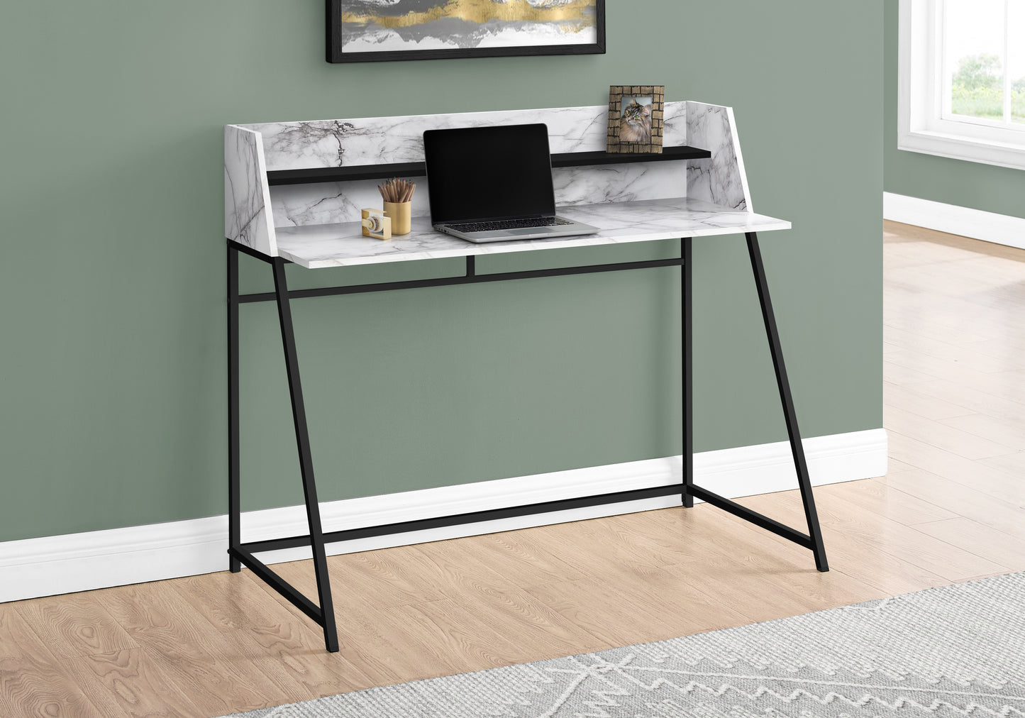 Modern marble print secretary desk with black metal legs and a laptop