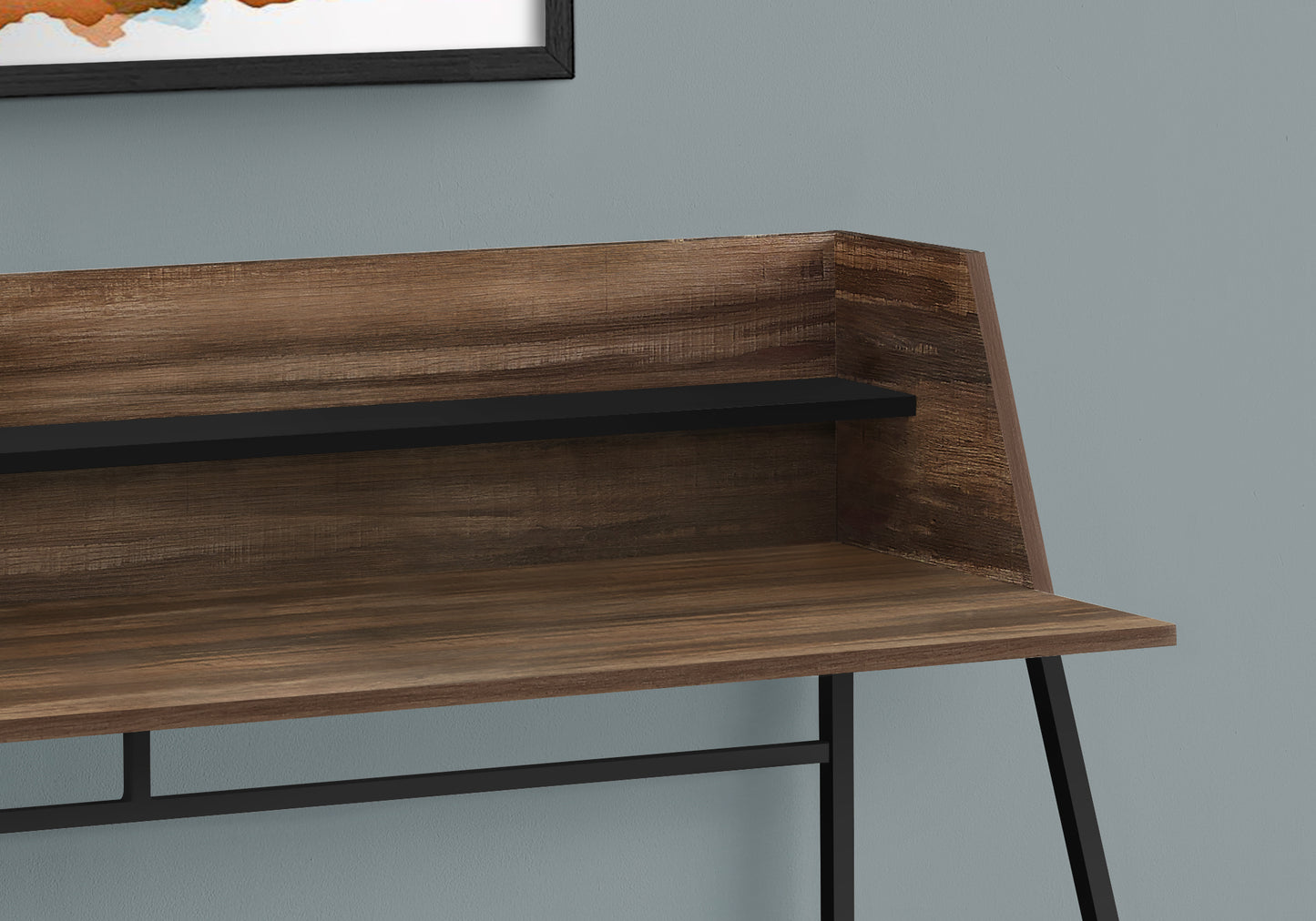 Modern wood grain desk with black metal legs and shelf