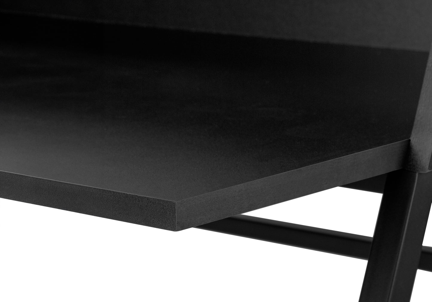 Black metal desk leg detail showcasing industrial design with clean lines