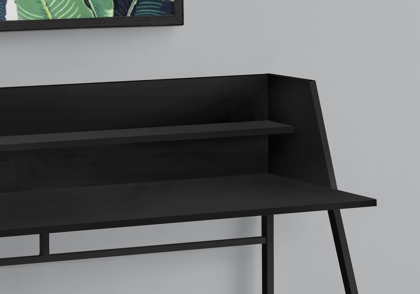 Modern black metal desk with two tiered shelves and an open workspace