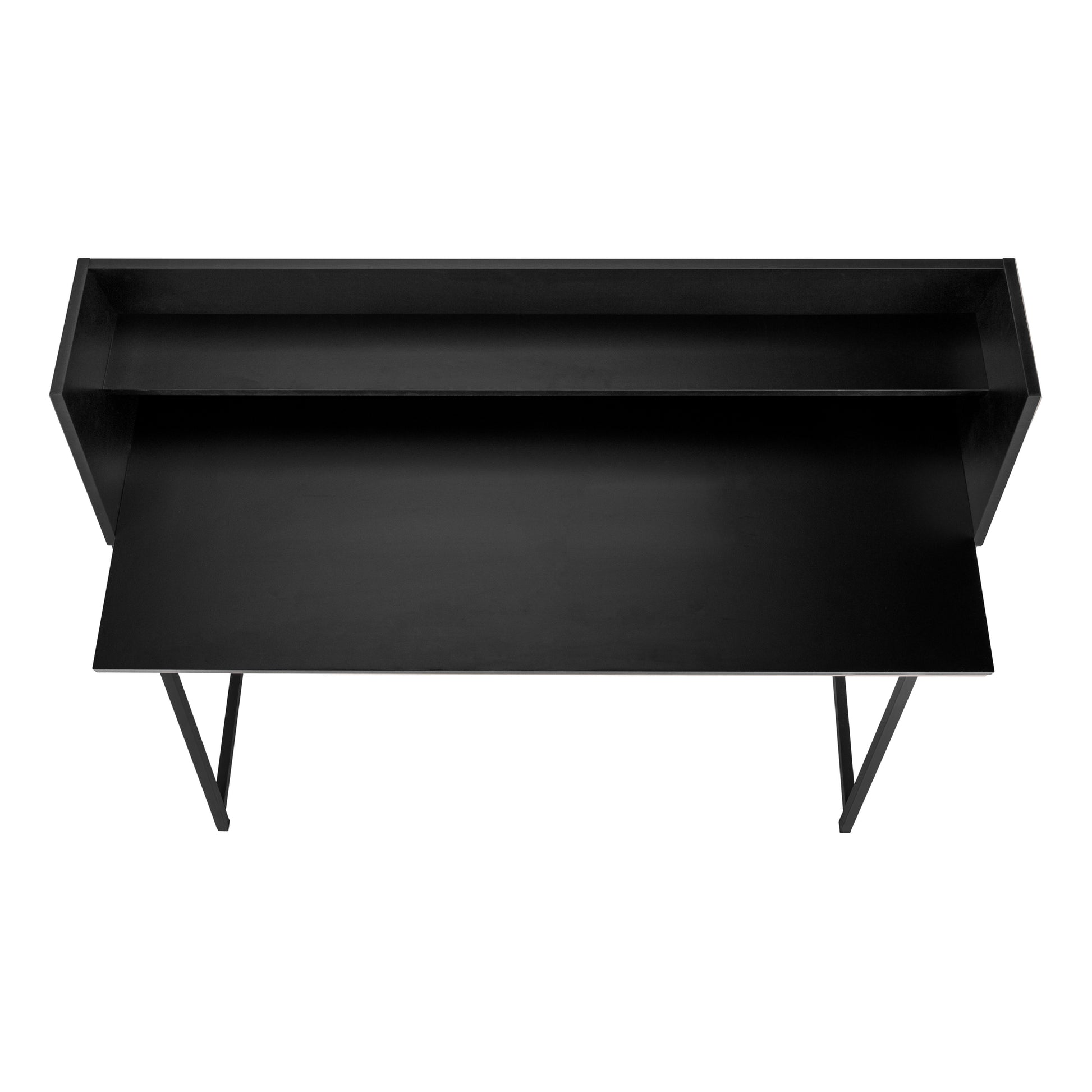 Minimalist black floating desk with a sleek design and thin metal legs