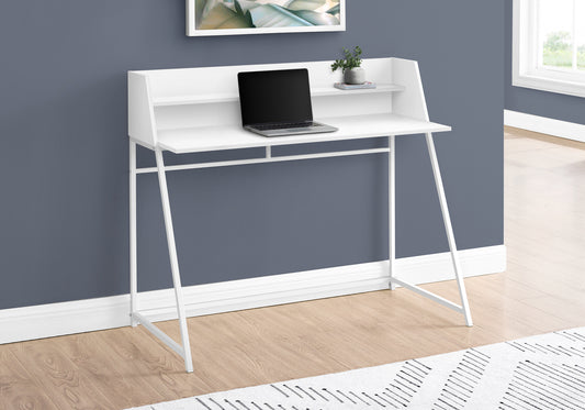 White minimalist writing desk with integrated shelves and laptop