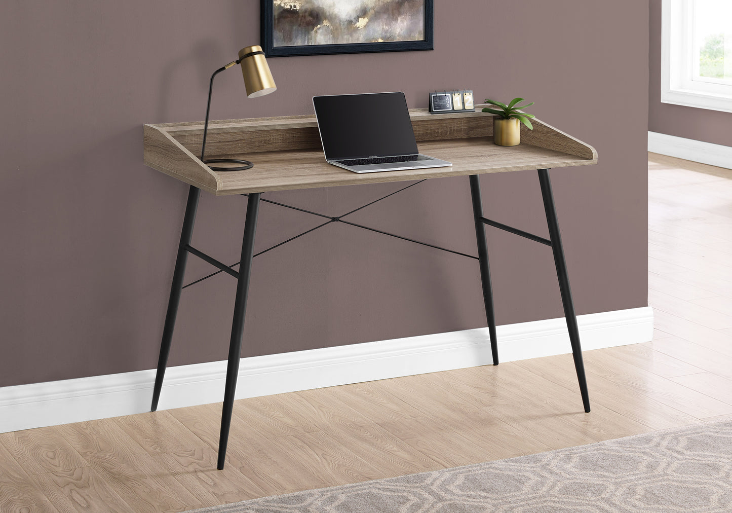 Rustic oak writing desk with metal legs perfect for a home office setup