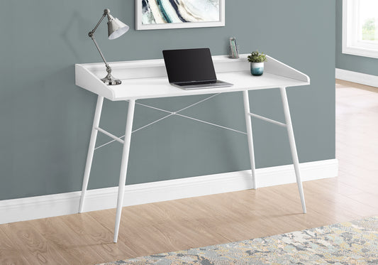 Modern white writing desk with minimalist design and silver desk lamp