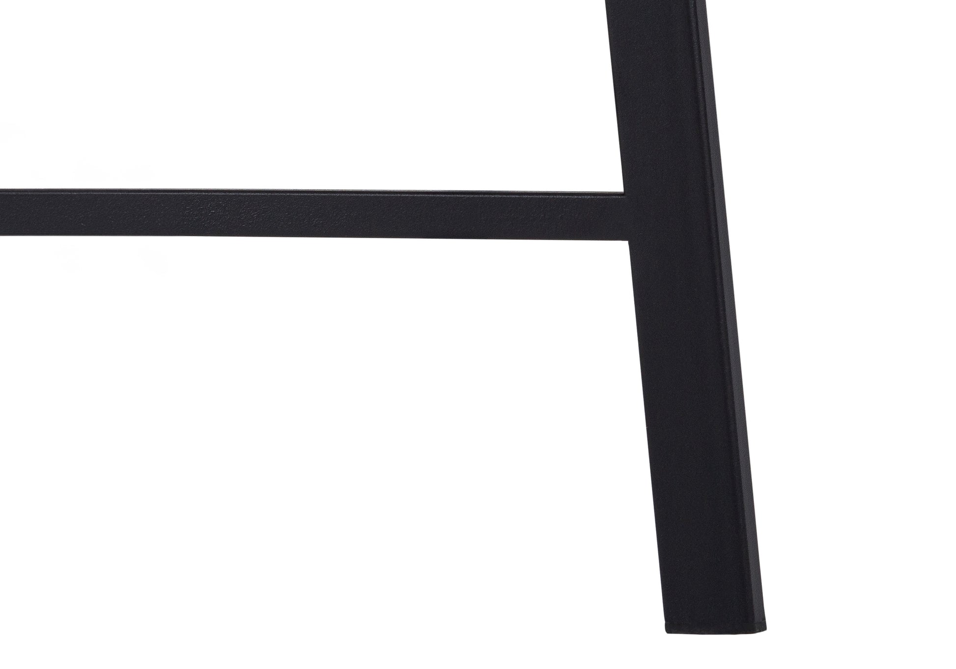 Closeup of a black metal table leg with a textured finish