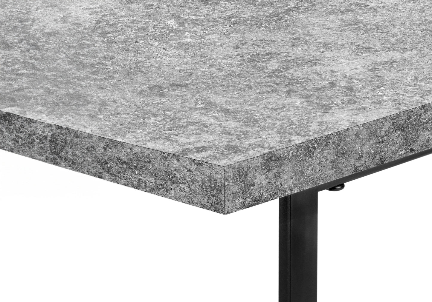 Closeup of a gray concrete laminate countertop with black metal leg support