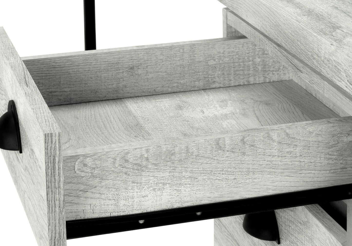 Rustic grey wash wood desk drawer with black hardware open and empty