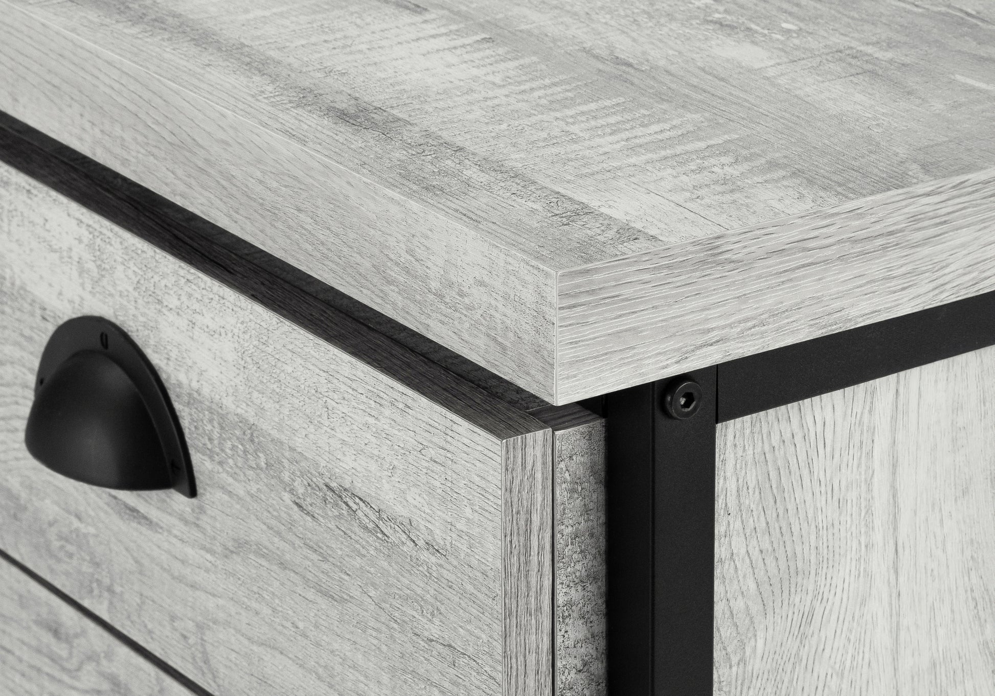 Gray wood grain dresser drawer with black hardware and industrial frame
