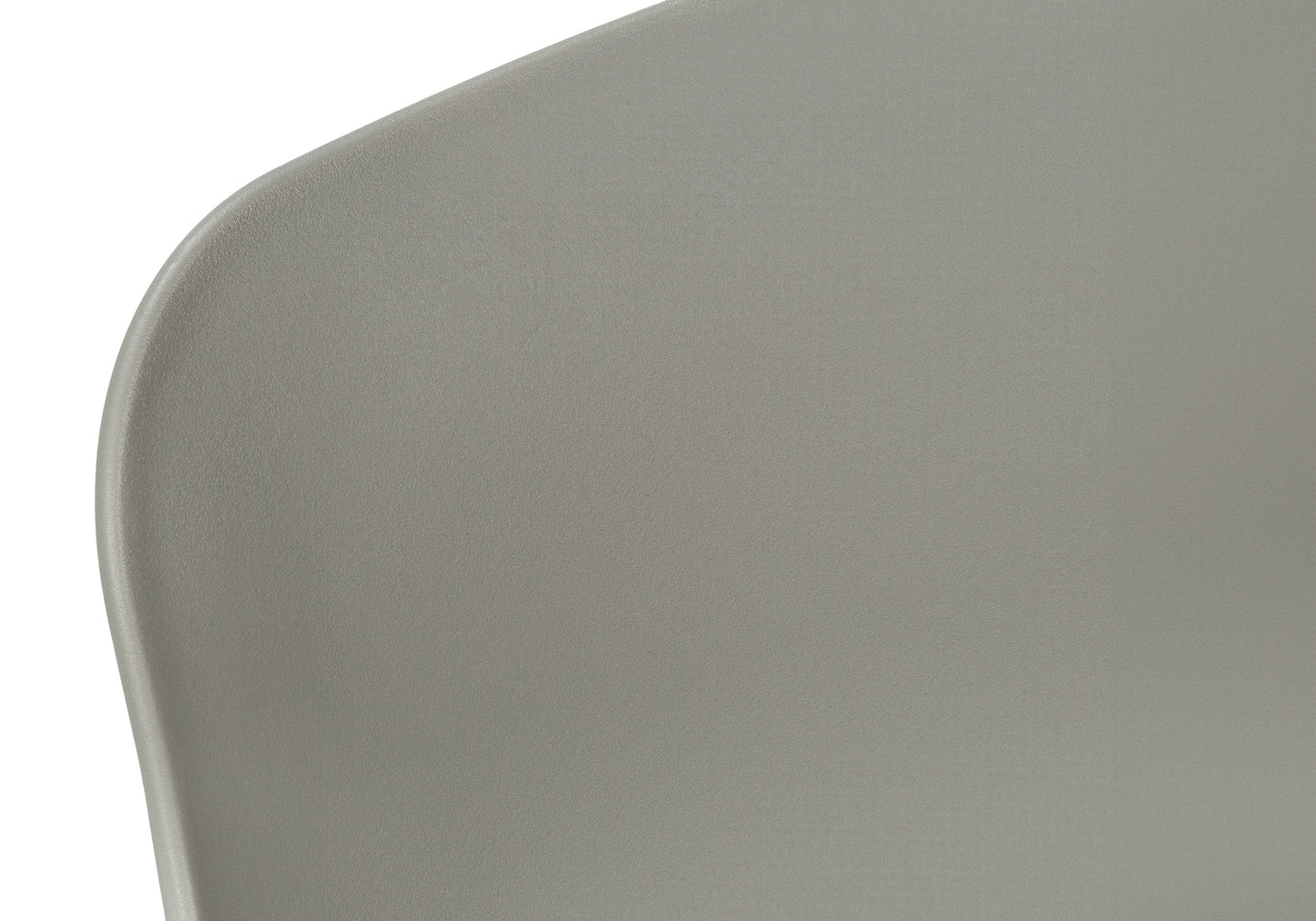 Closeup of a textured grey plastic chair back modern design