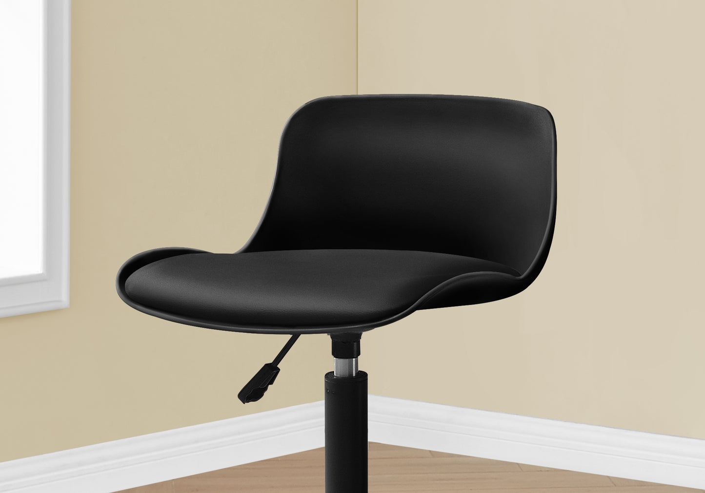 Black modern ergonomic office chair with adjustable height lever and contoured seat