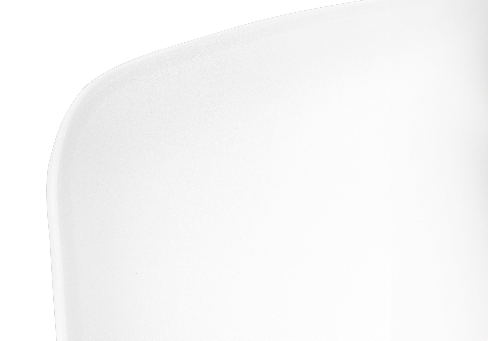 Closeup of a smooth white matte finish for a modern desk chair back
