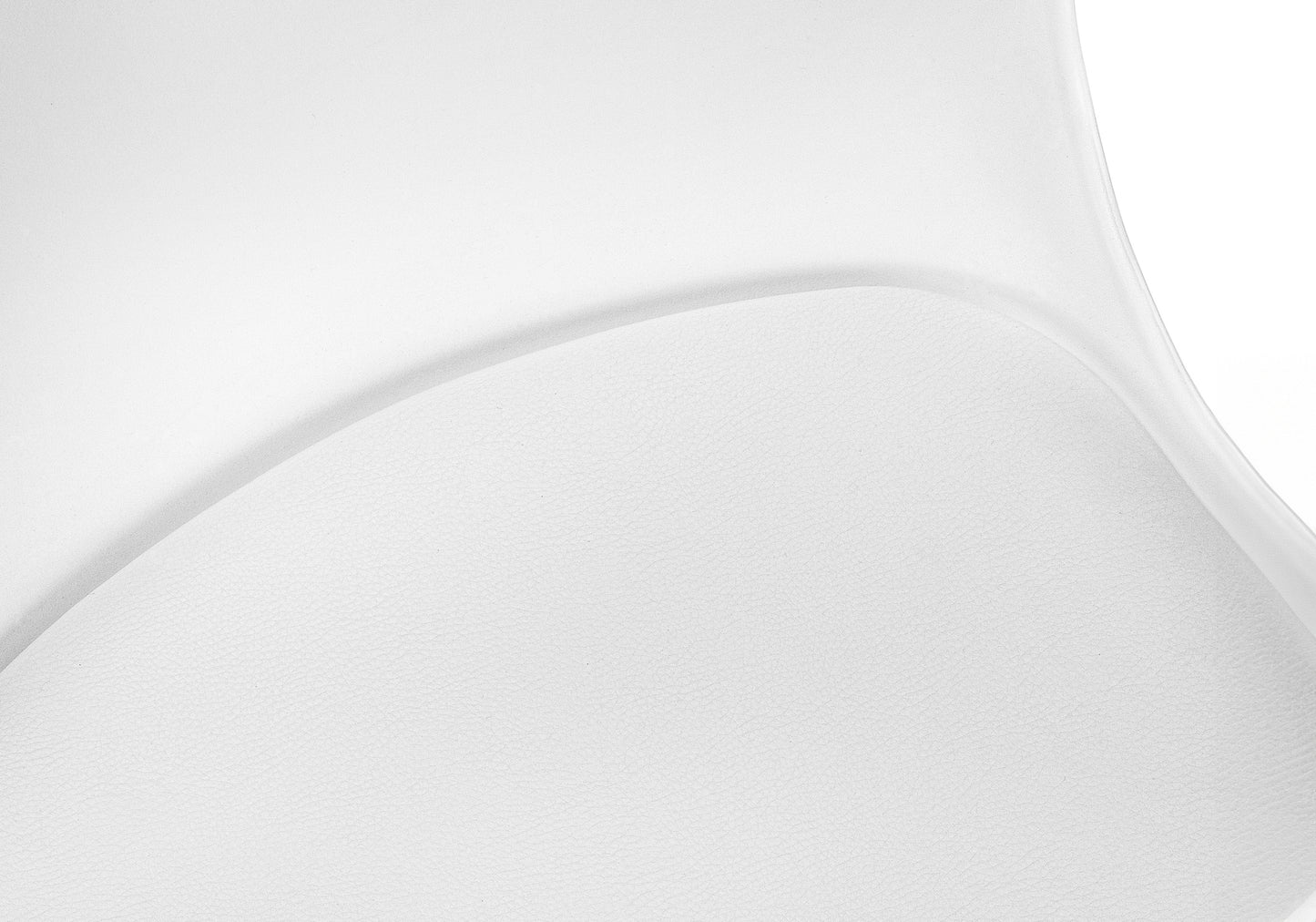 Closeup of a white textured faux leather seat for a modern dining chair
