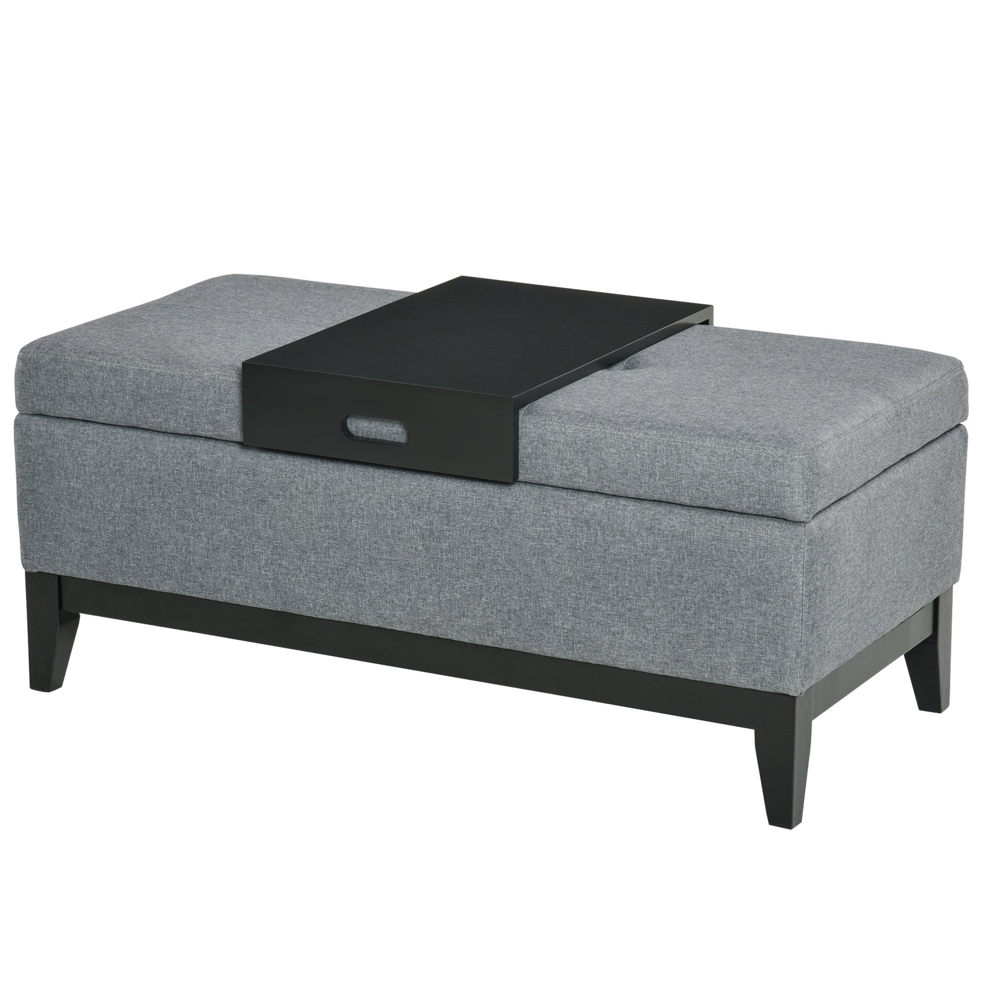 Gray fabric storage ottoman with black wood legs and a removable black tray