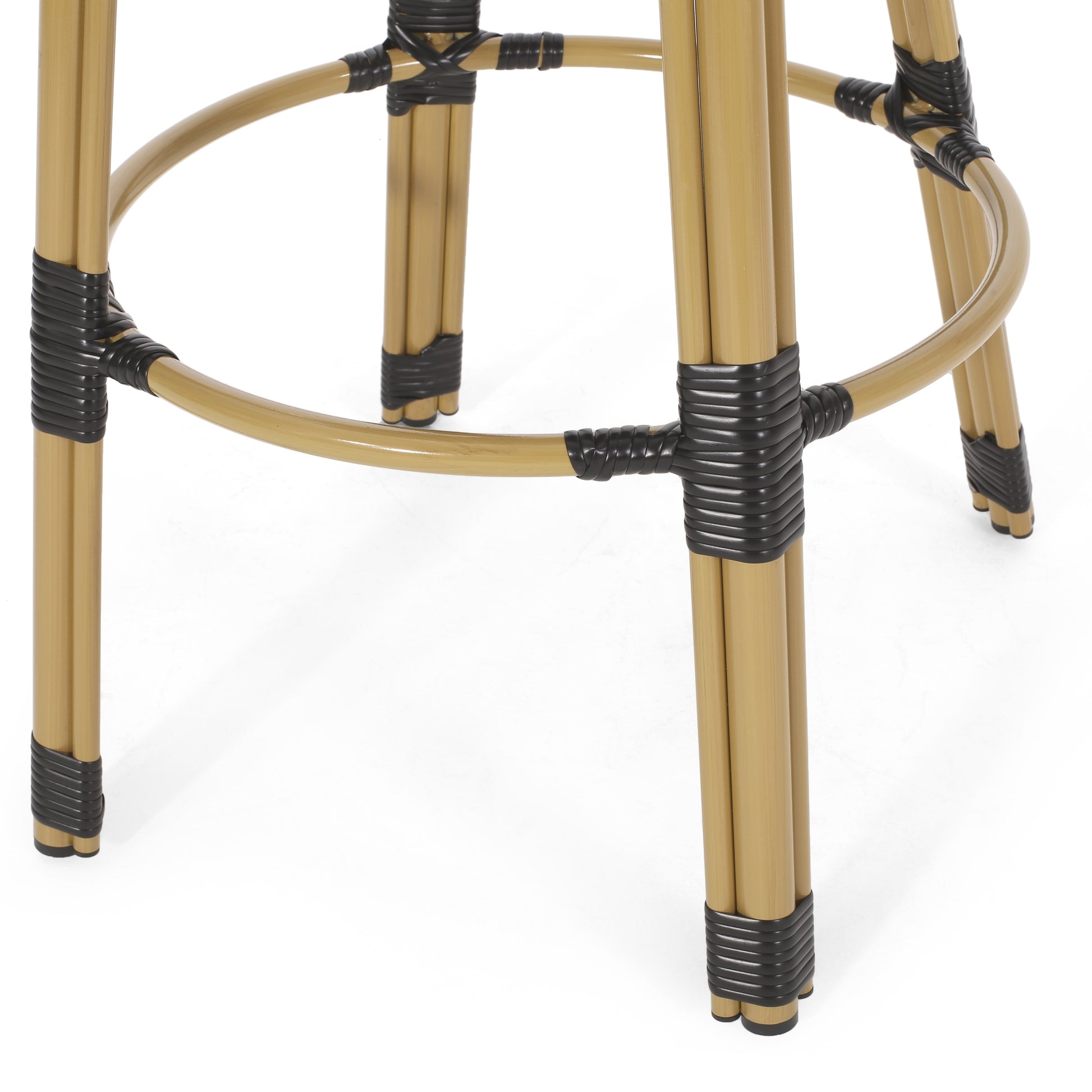 Gold rattan bar stool legs with black woven accents