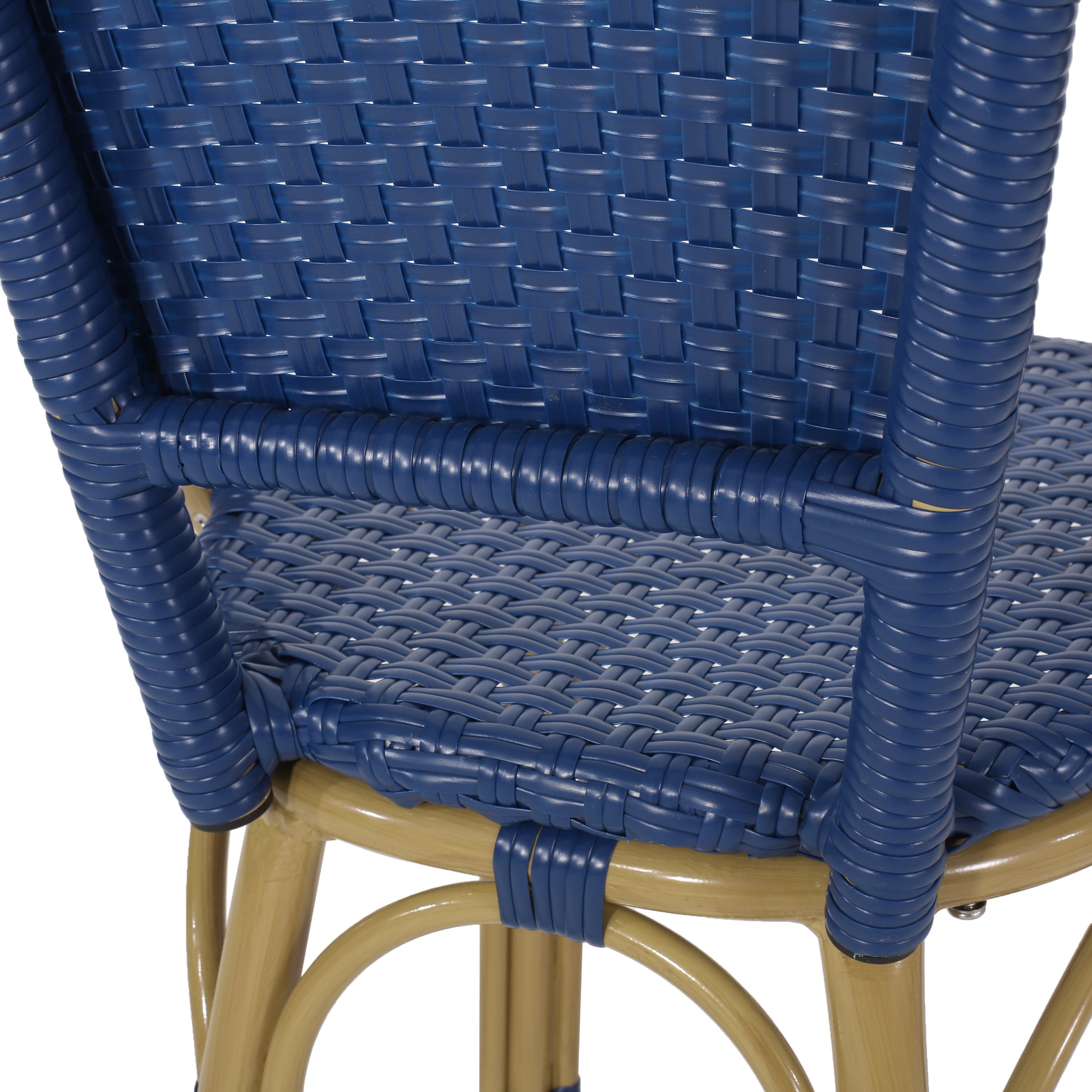 Closeup of blue woven rattan chair back and seat detail showing intricate pattern and bamboo frame