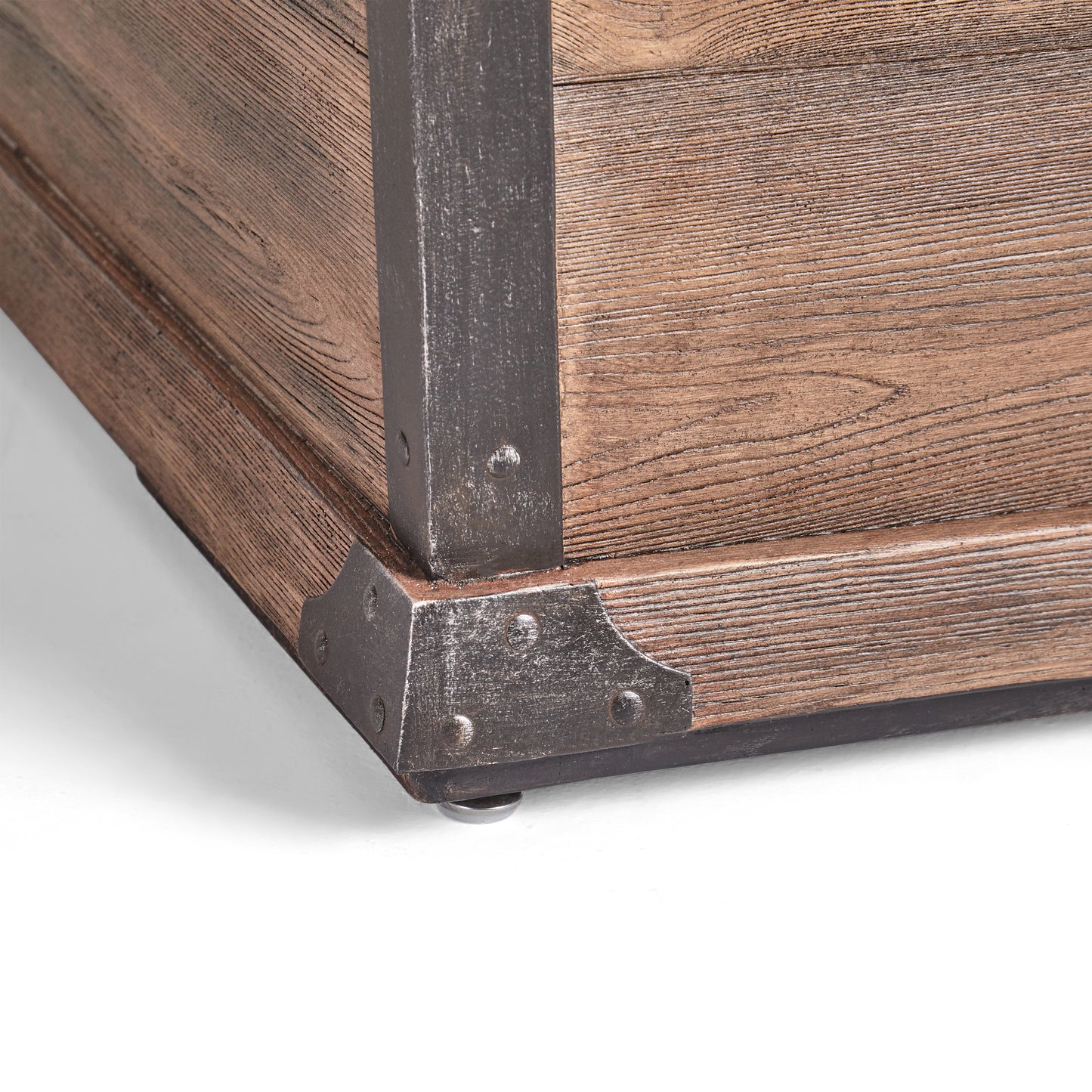 Rustic wood end table corner detail with distressed finish and industrial metal brackets