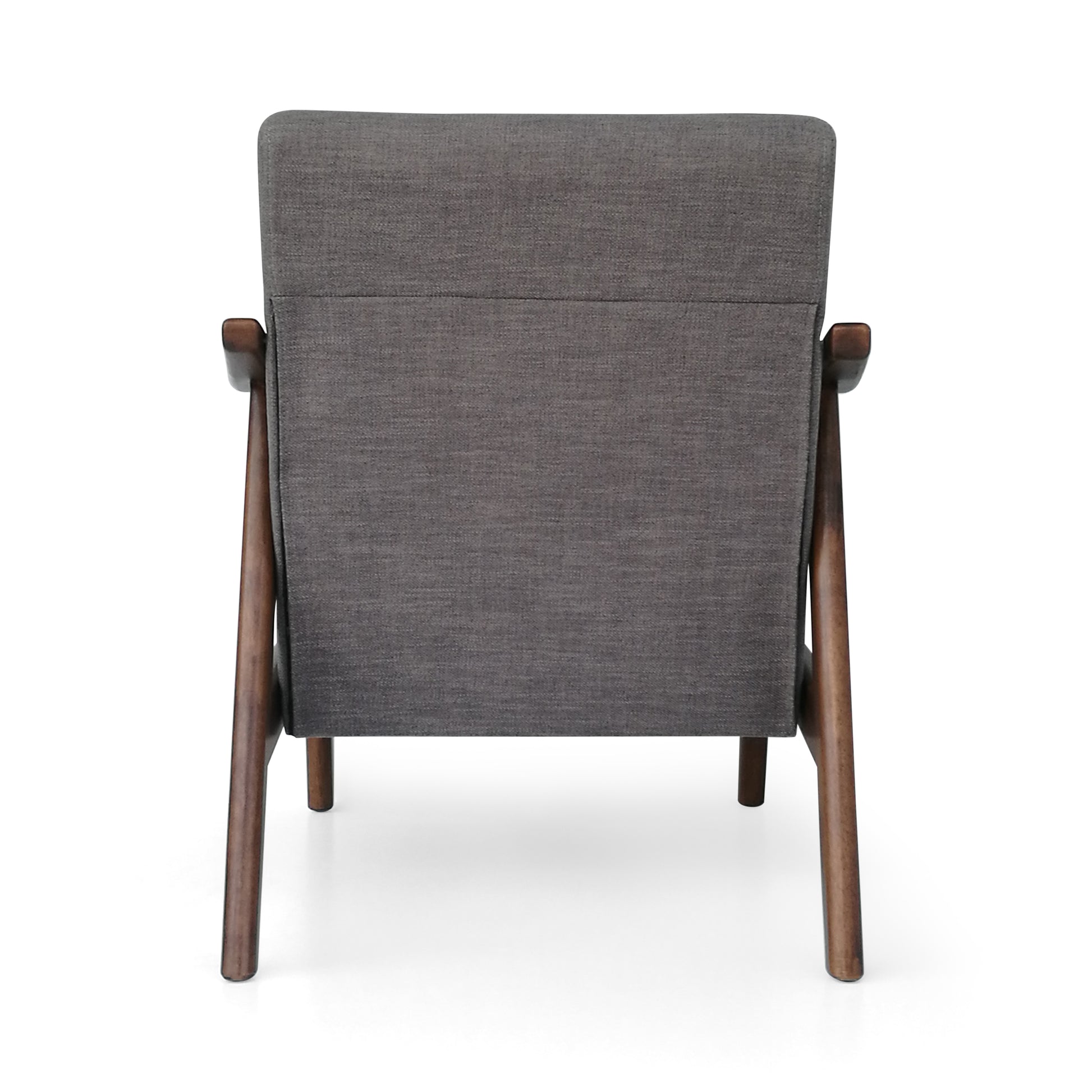Back view of a dark grey fabric accent chair with wooden legs