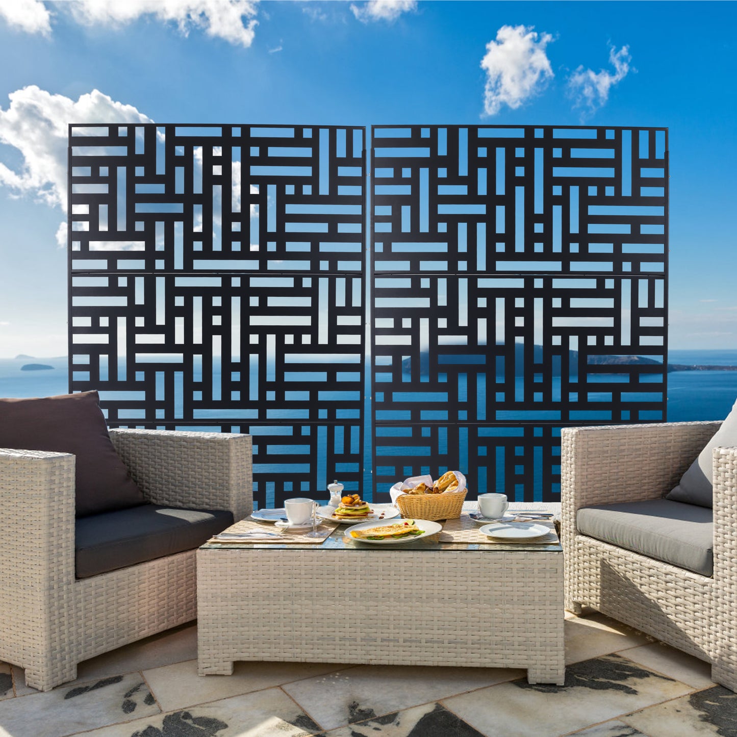Modern black metal privacy screen with geometric cutouts for garden or patio use