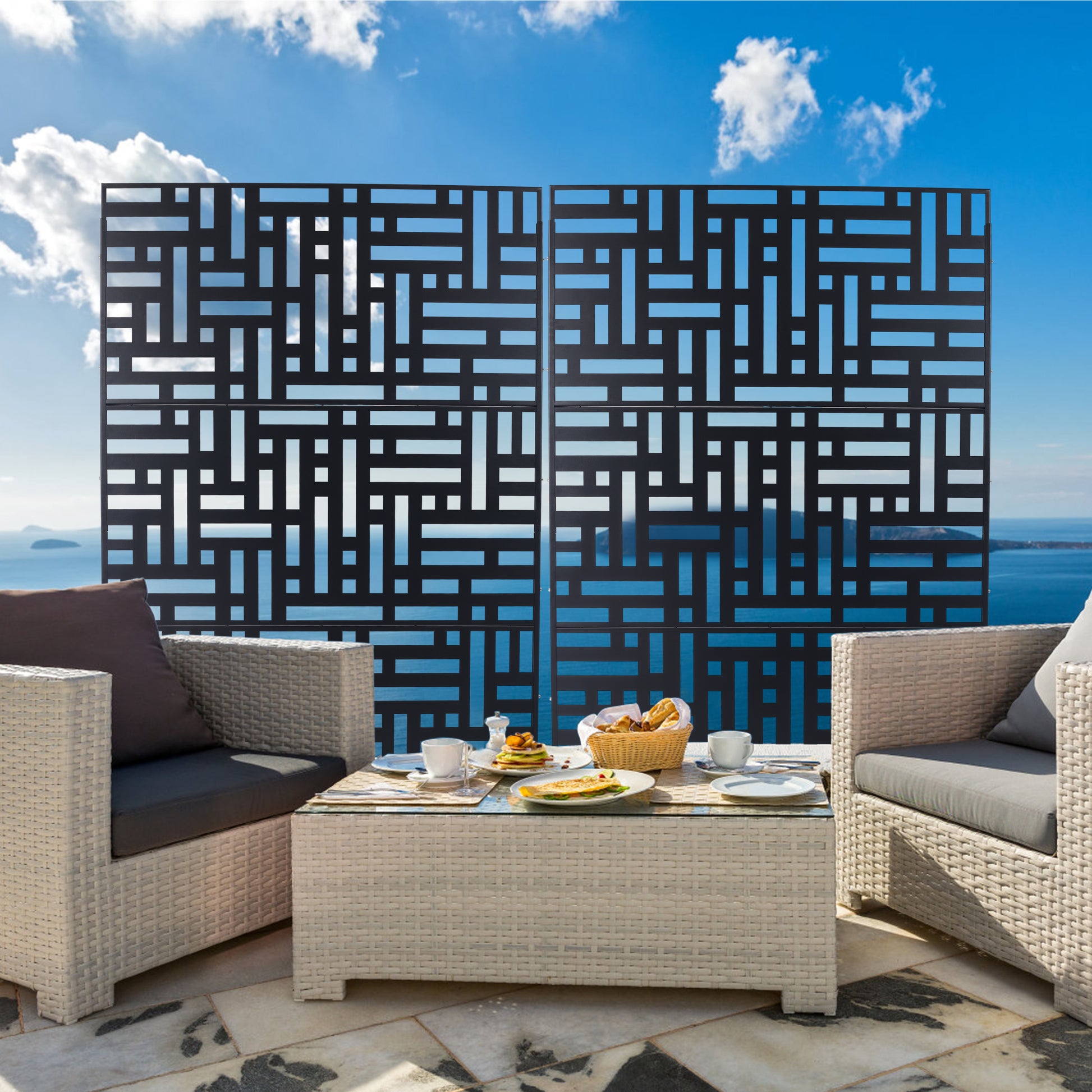 Modern black metal privacy screen with geometric cutouts for garden or patio use
