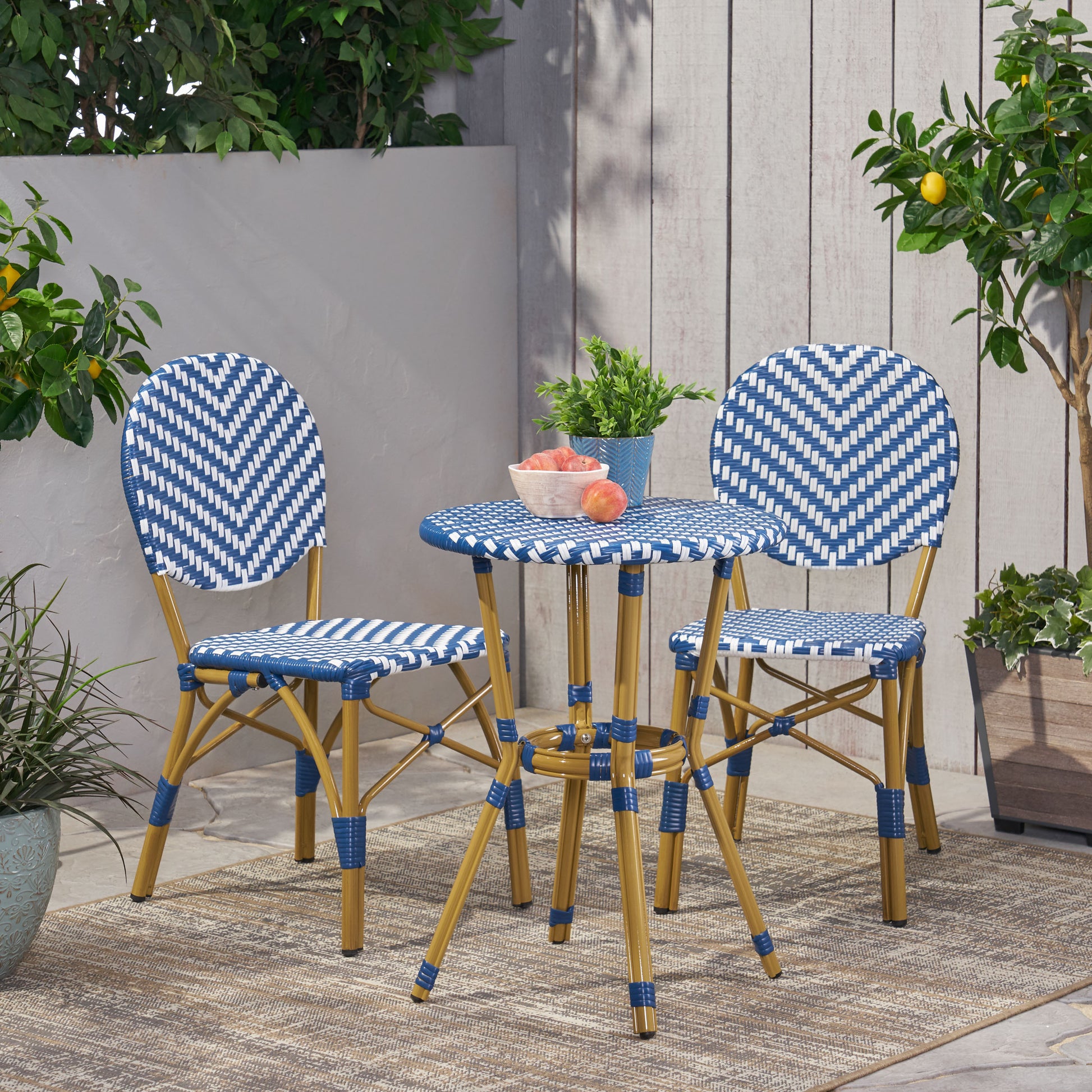 Blue and white chevron wicker bistro set for outdoor dining