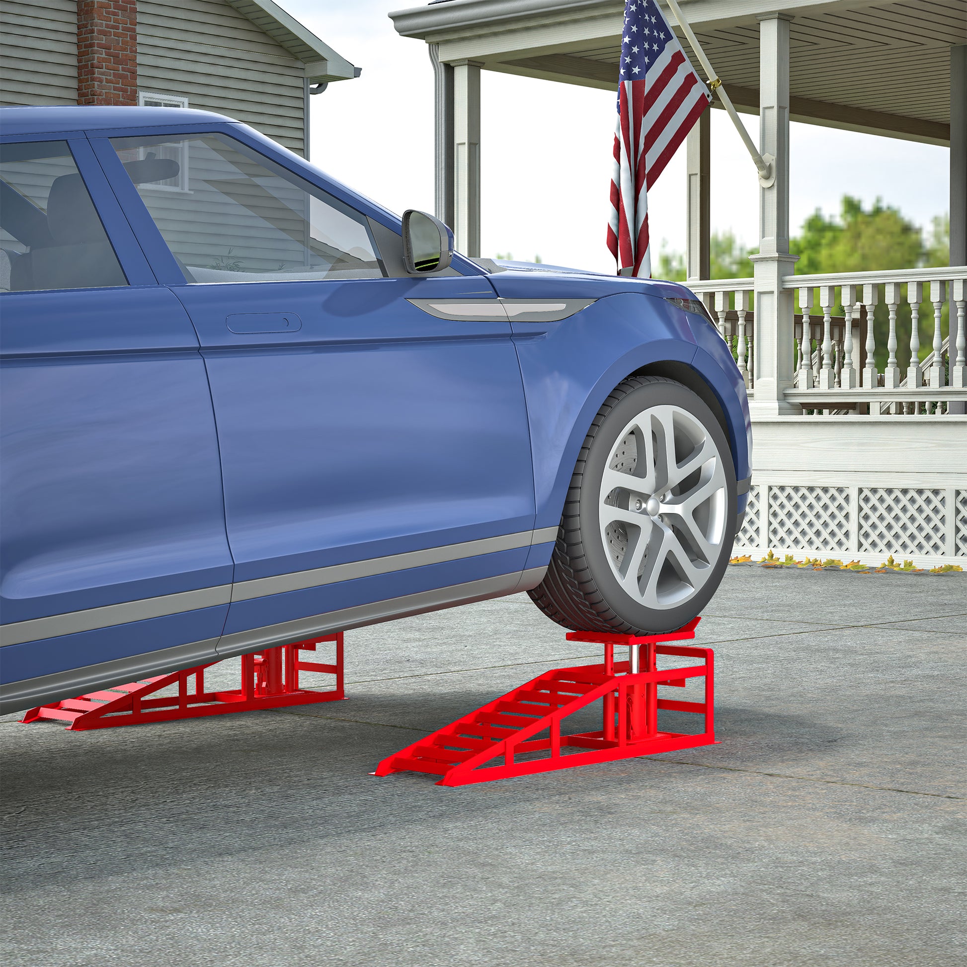 Red hydraulic car ramps lifting a blue SUV for maintenance