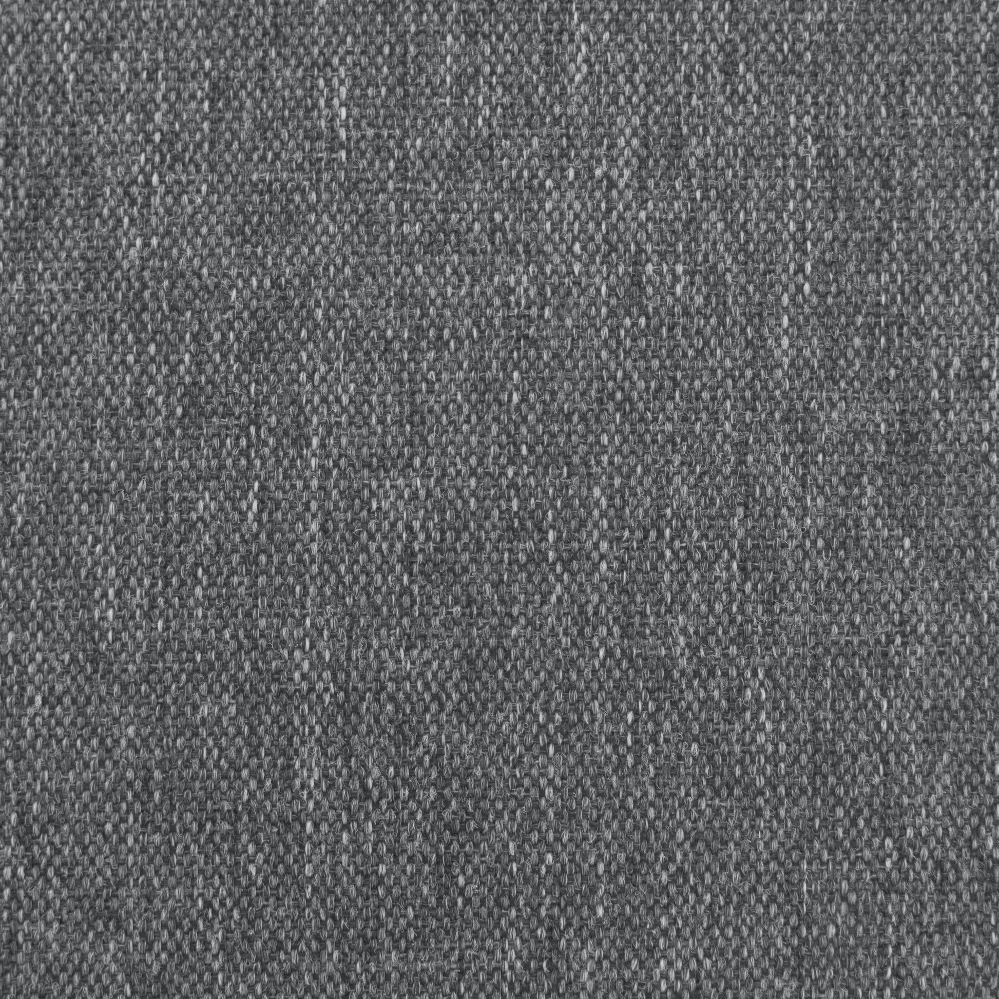 Closeup of a dark grey textured fabric with visible weave pattern