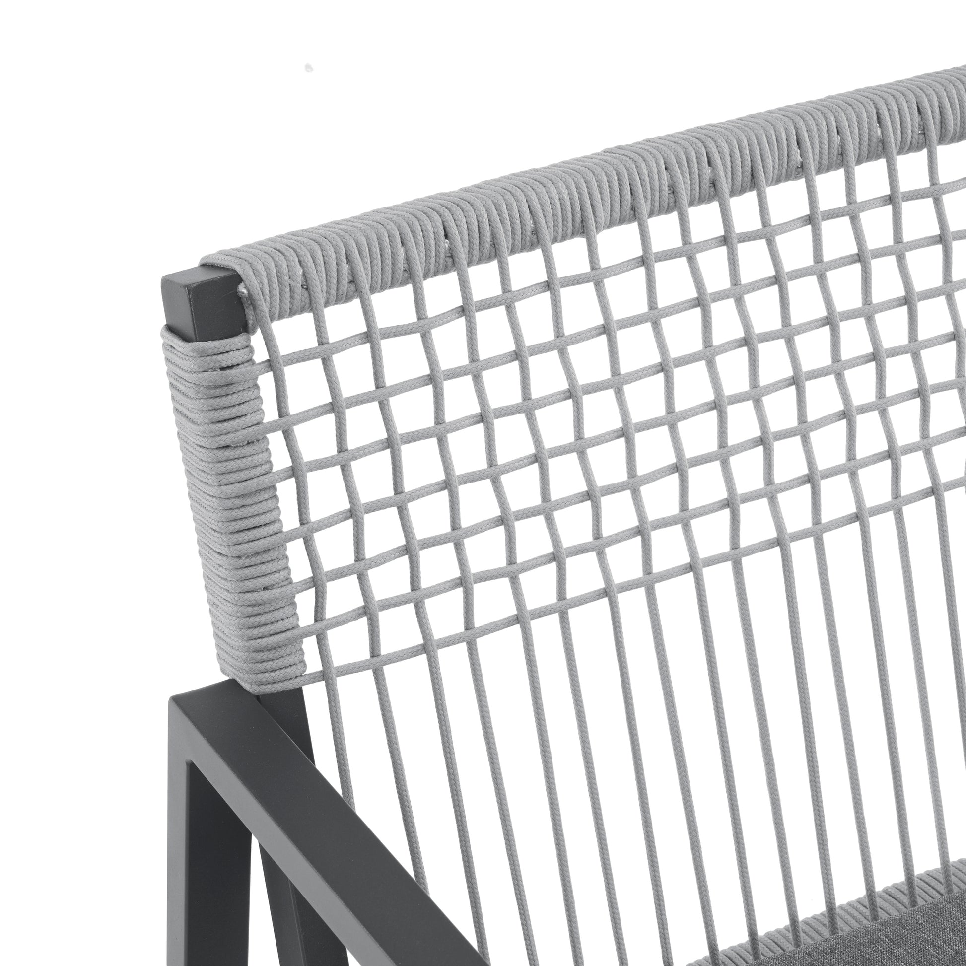 Closeup of a gray ropeback dining chair with a modern minimalist design