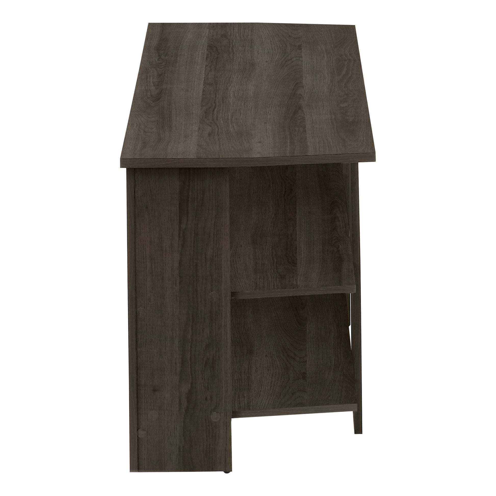 Dark wood corner TV stand with open shelving and a slanted top