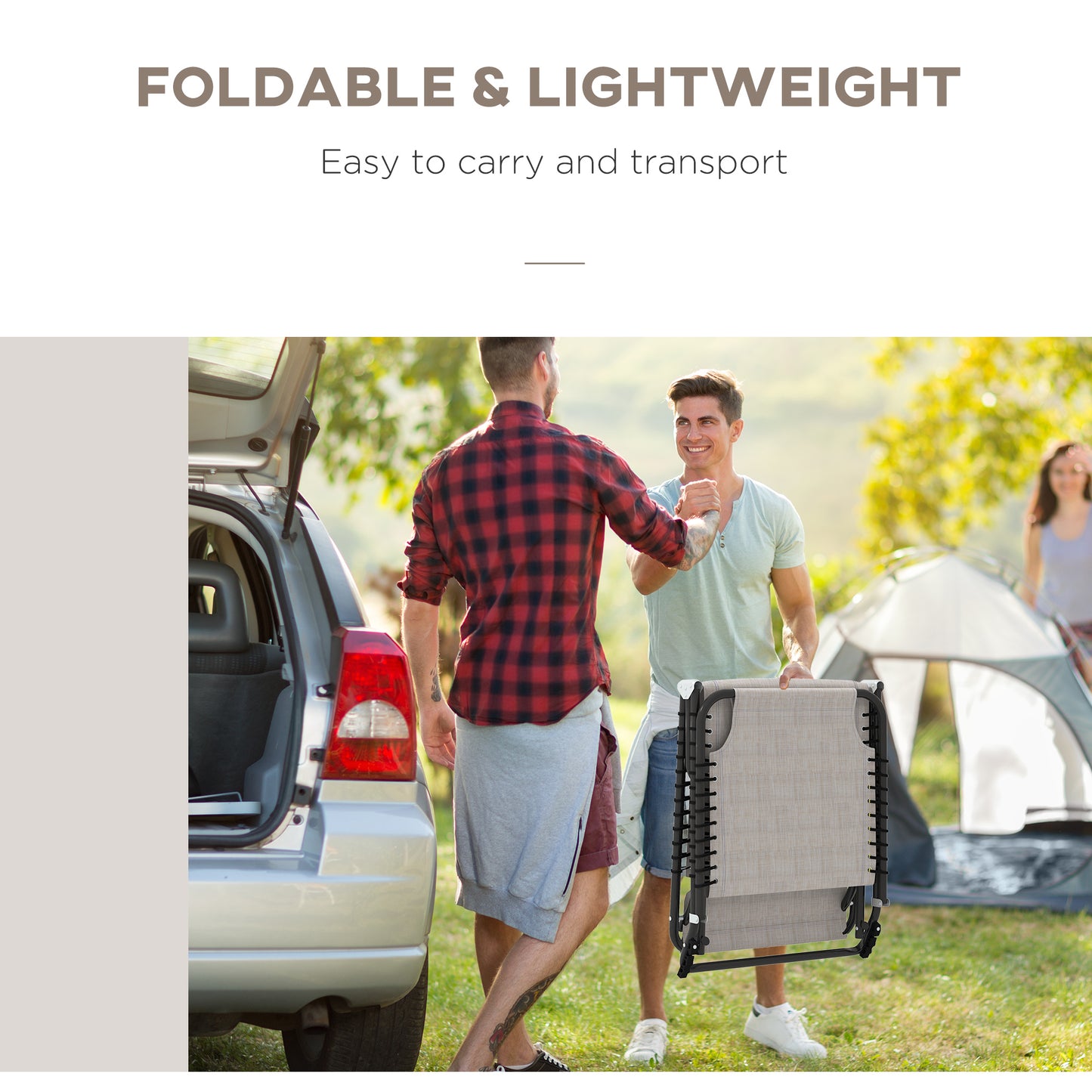 Two men carrying a foldable zero gravity chair outdoors for camping and relaxation