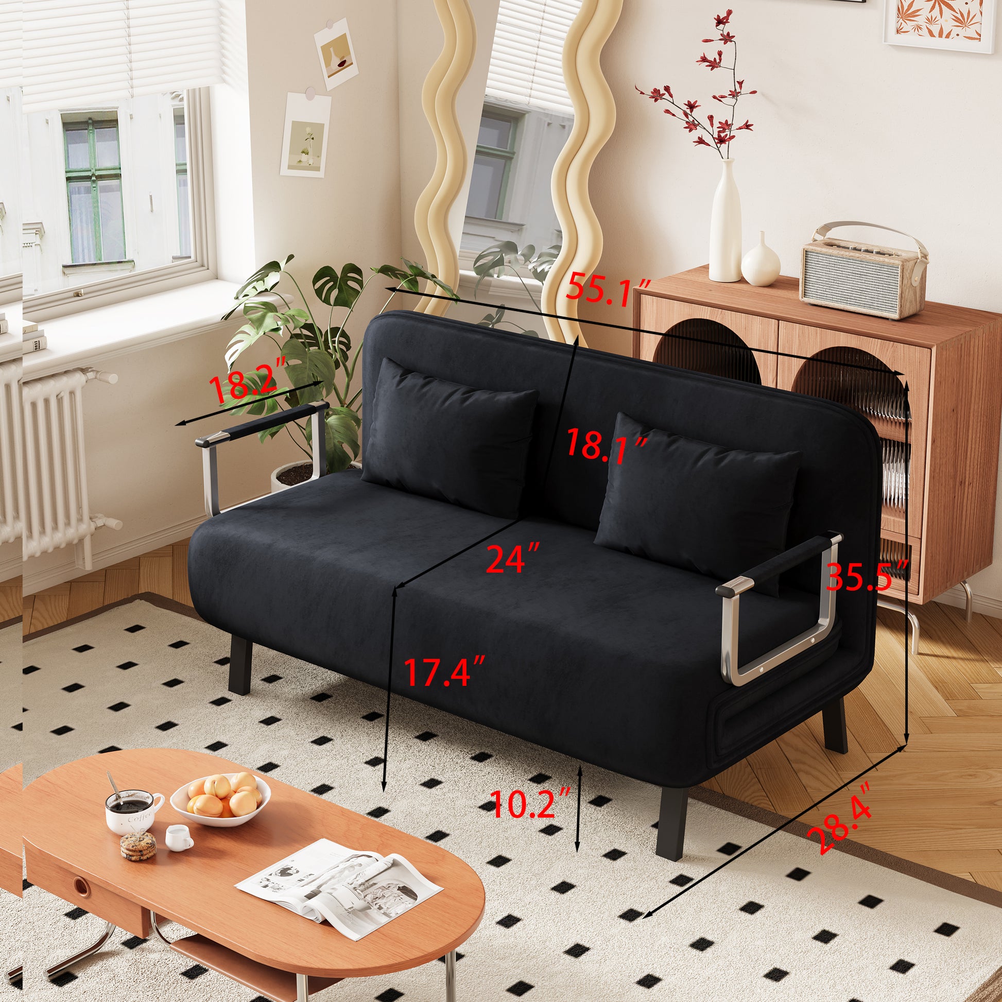 Black velvet sofa with chrome arms perfect for a small apartment