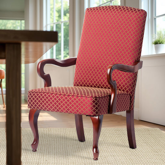 Elegant arm chair with ruby red diamond pattern fabric and dark wood legs perfect for dining