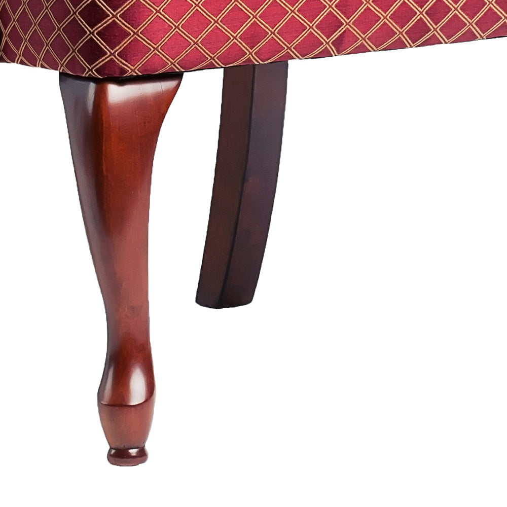 Mahogany cabriole leg on upholstered bench with diamond pattern
