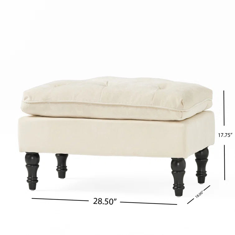 Cream velvet tufted ottoman with dark wooden legs