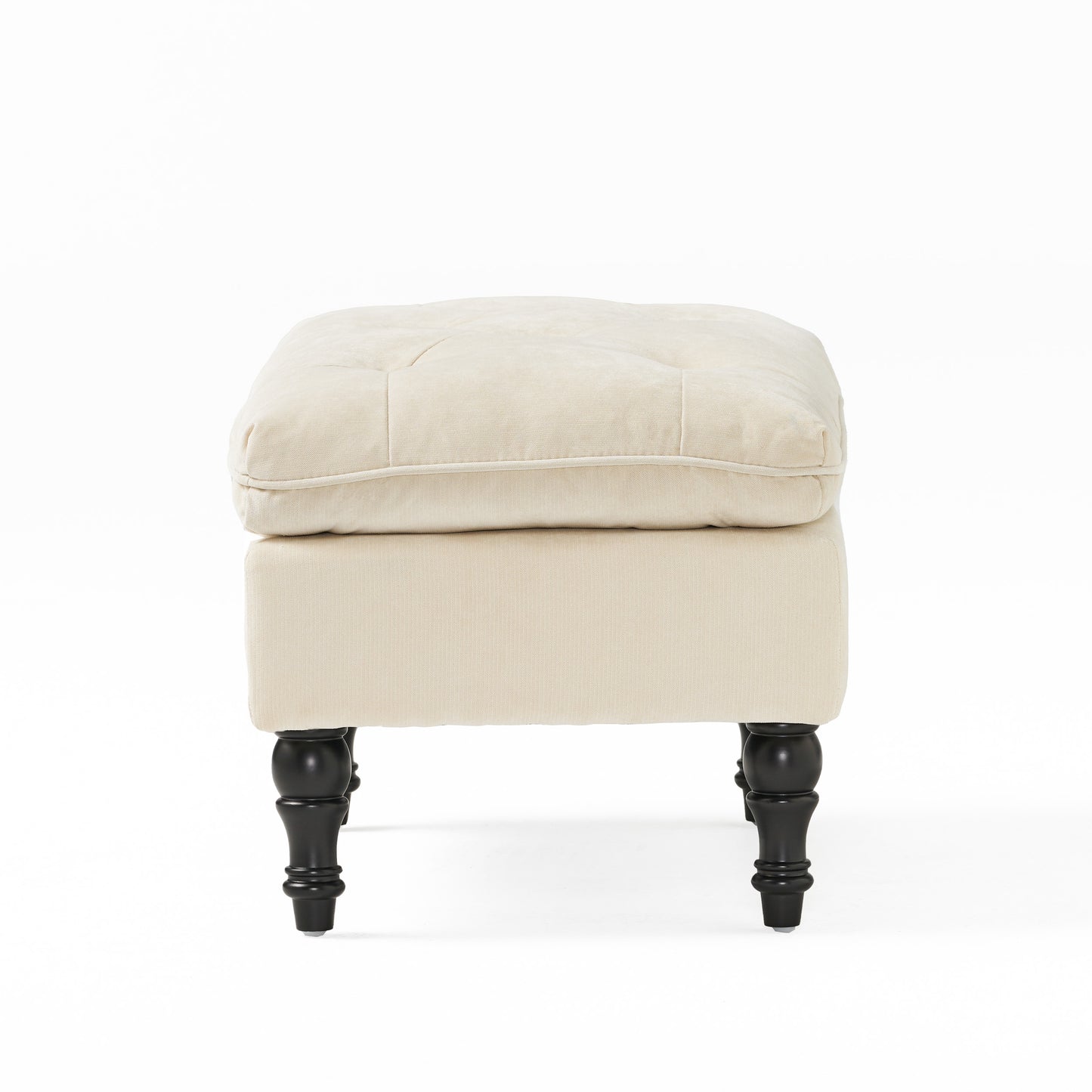 Cream tufted velvet ottoman with carved dark wood legs