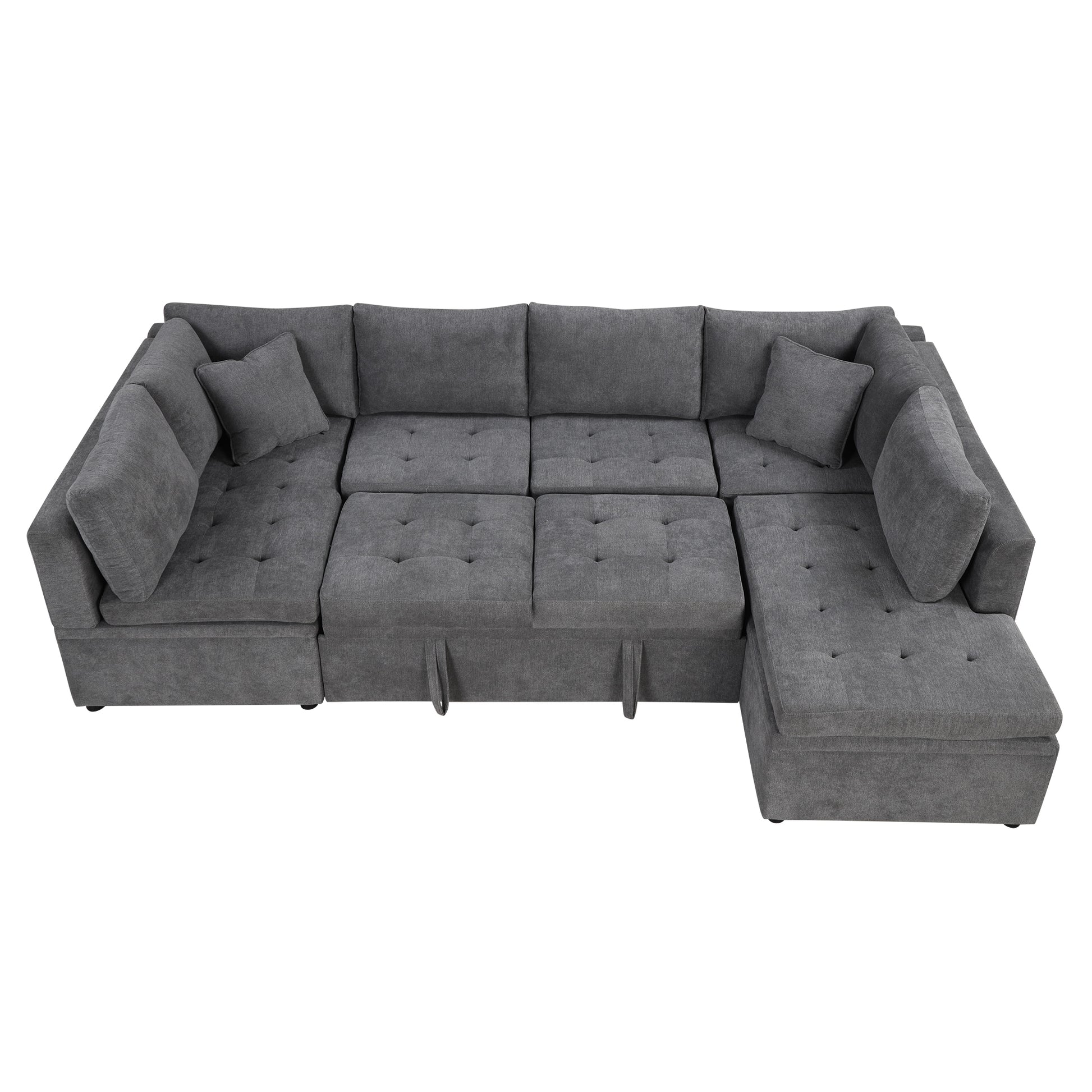 Plush charcoal grey fabric sectional sofa with tufted cushions and multiple seating areas