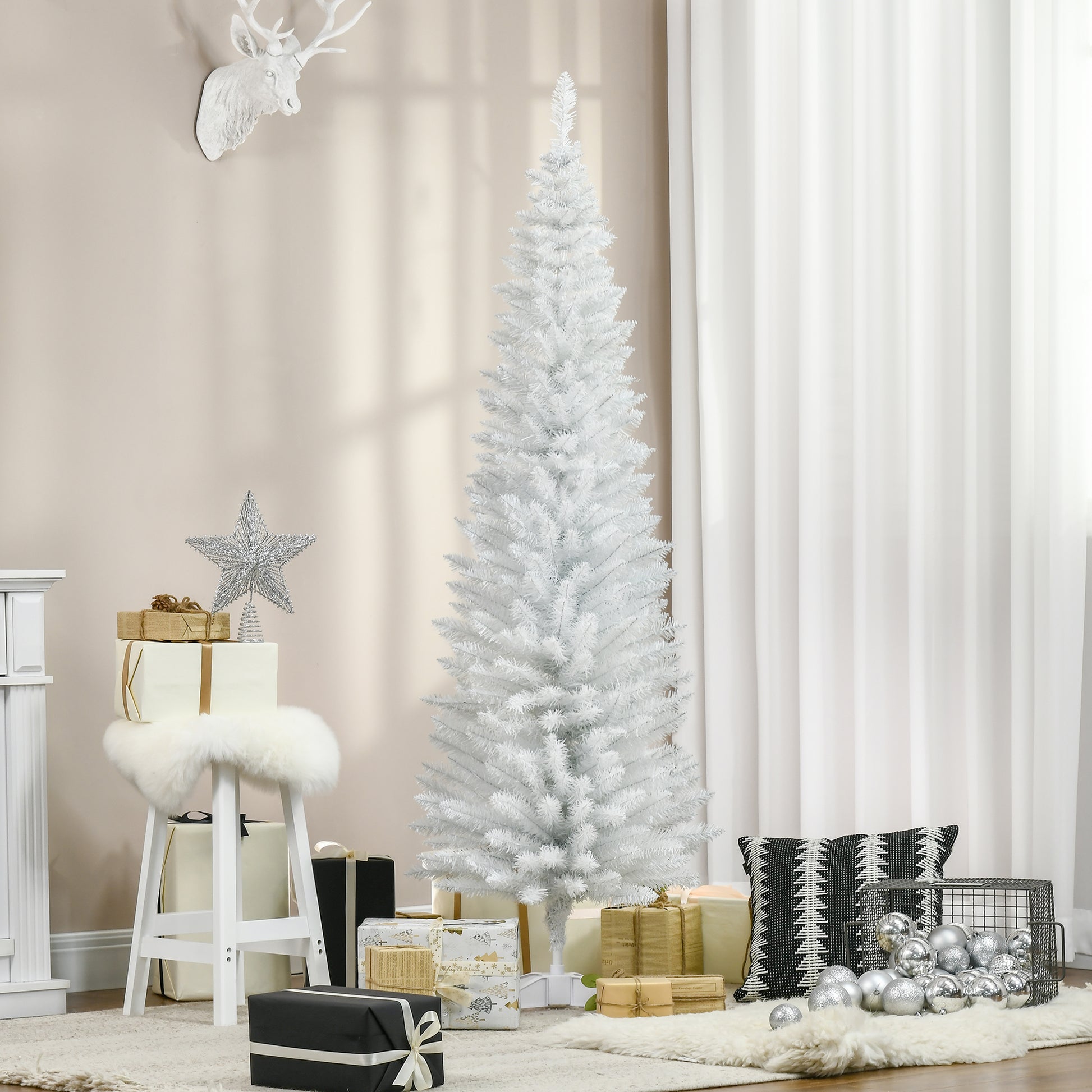 Tall white artificial Christmas tree with sparse branches ideal for modern holiday decor
