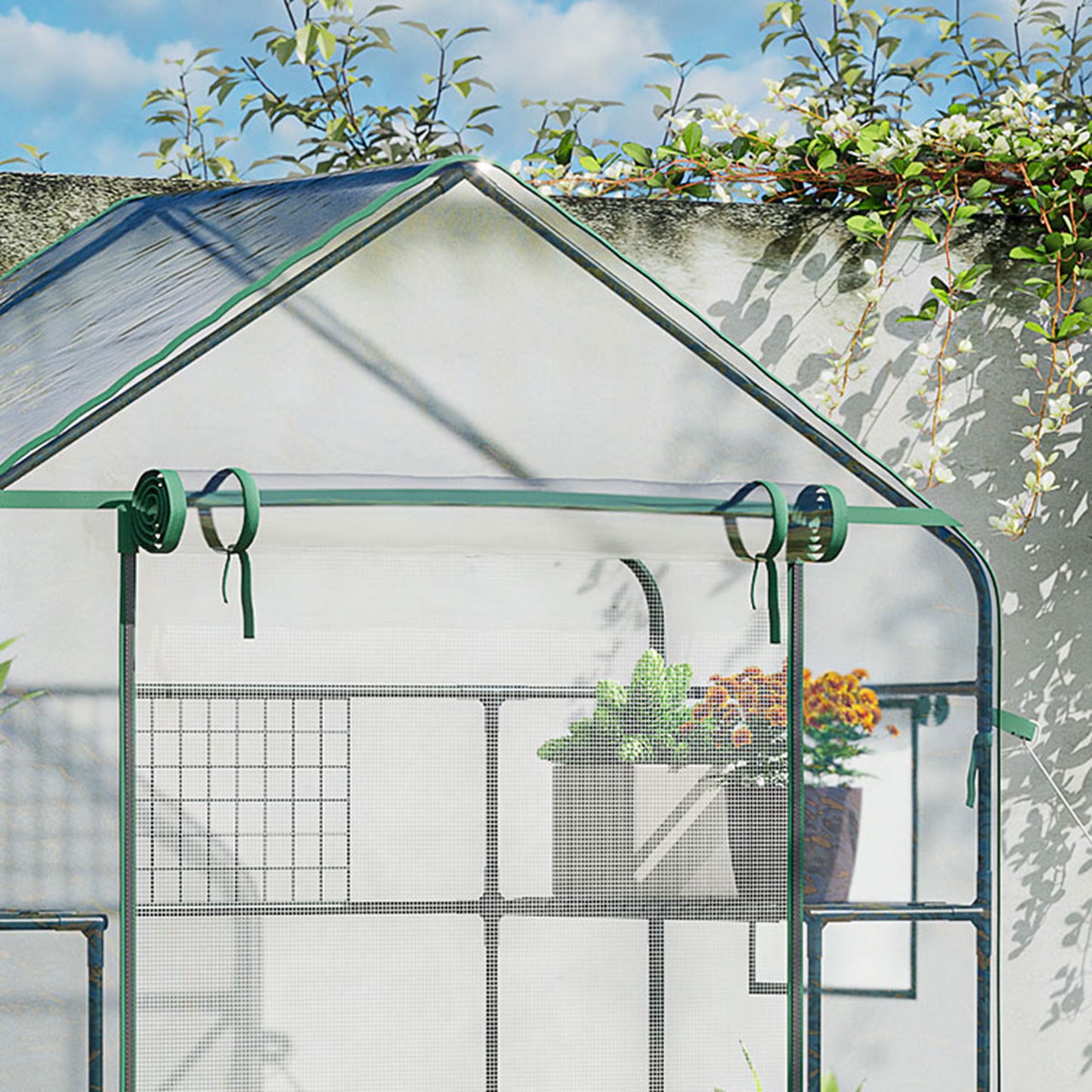 Green portable greenhouse with shelves ideal for small gardens